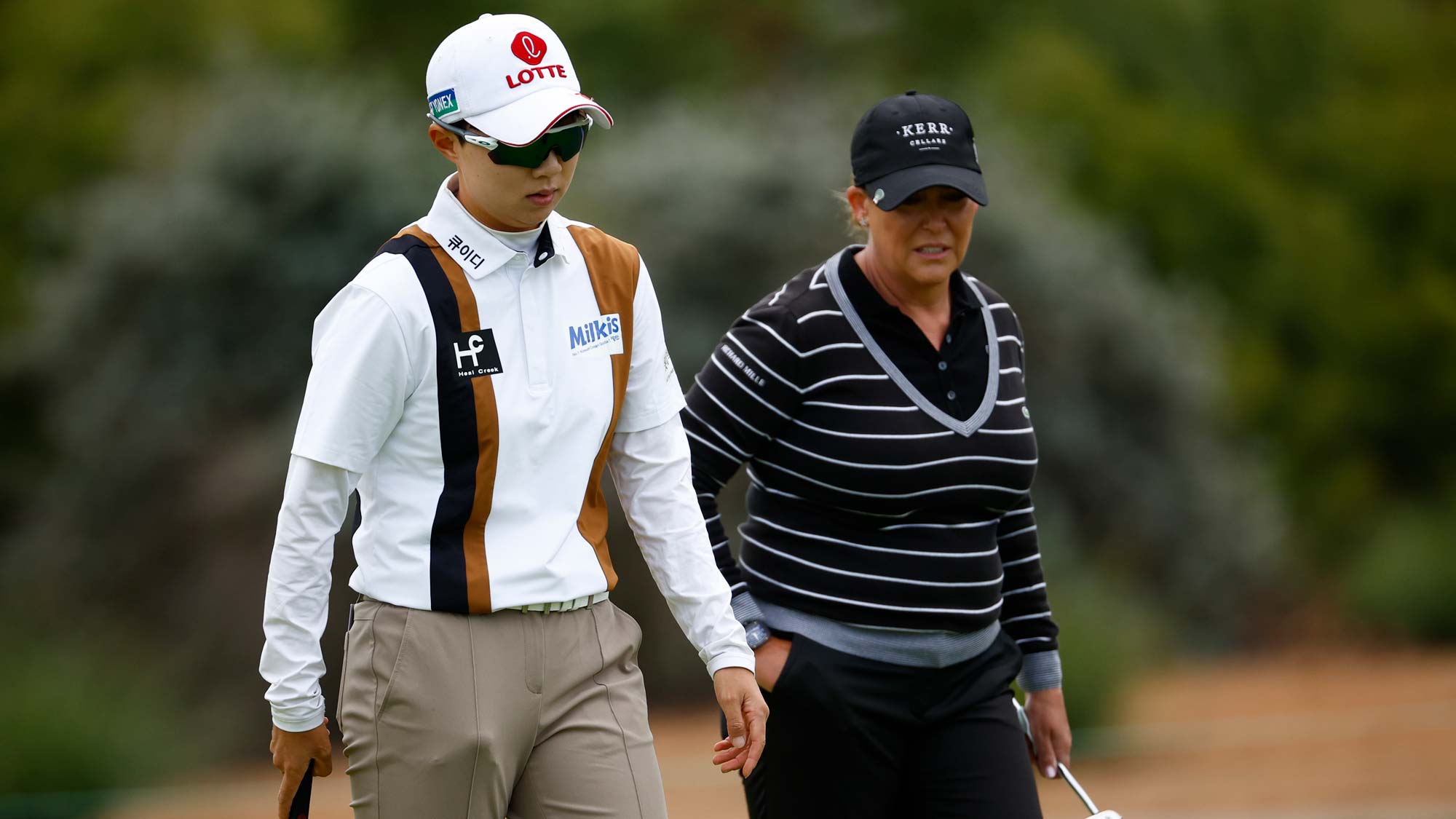 (L-R) Hyo Joo Kim of South Korea and Cristie Kerr of the United States are seen on the 12th green during the second round of the DIO Implant LA Open