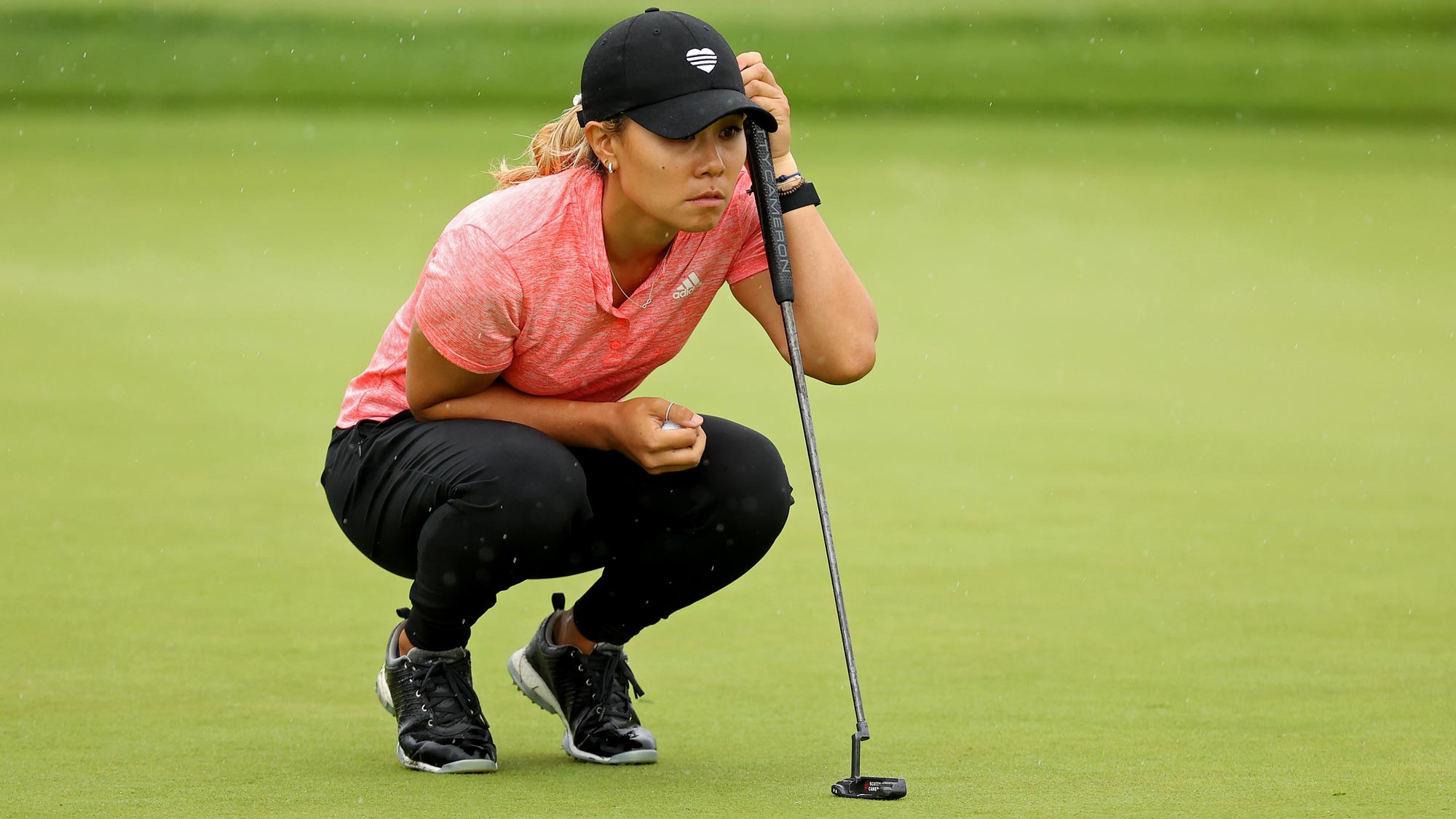Danielle Kang lines up a putt on the second green during the second round of the LPGA Drive On Championship
