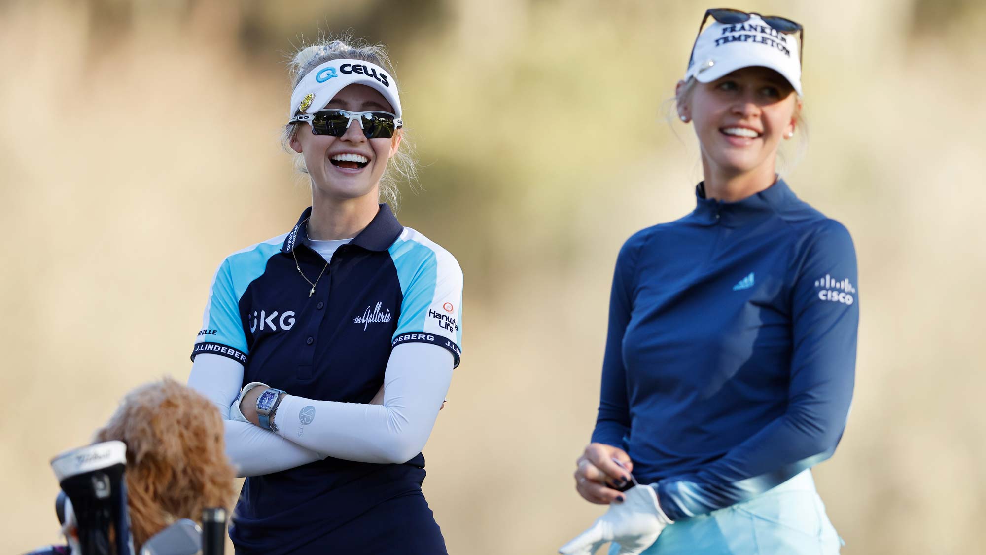 Nelly Korda of the United States (L) talks with her sister, Jessica Korda of the United States from the ninth tee during the second round of the LPGA Drive On Championship at Golden Ocala Golf Club