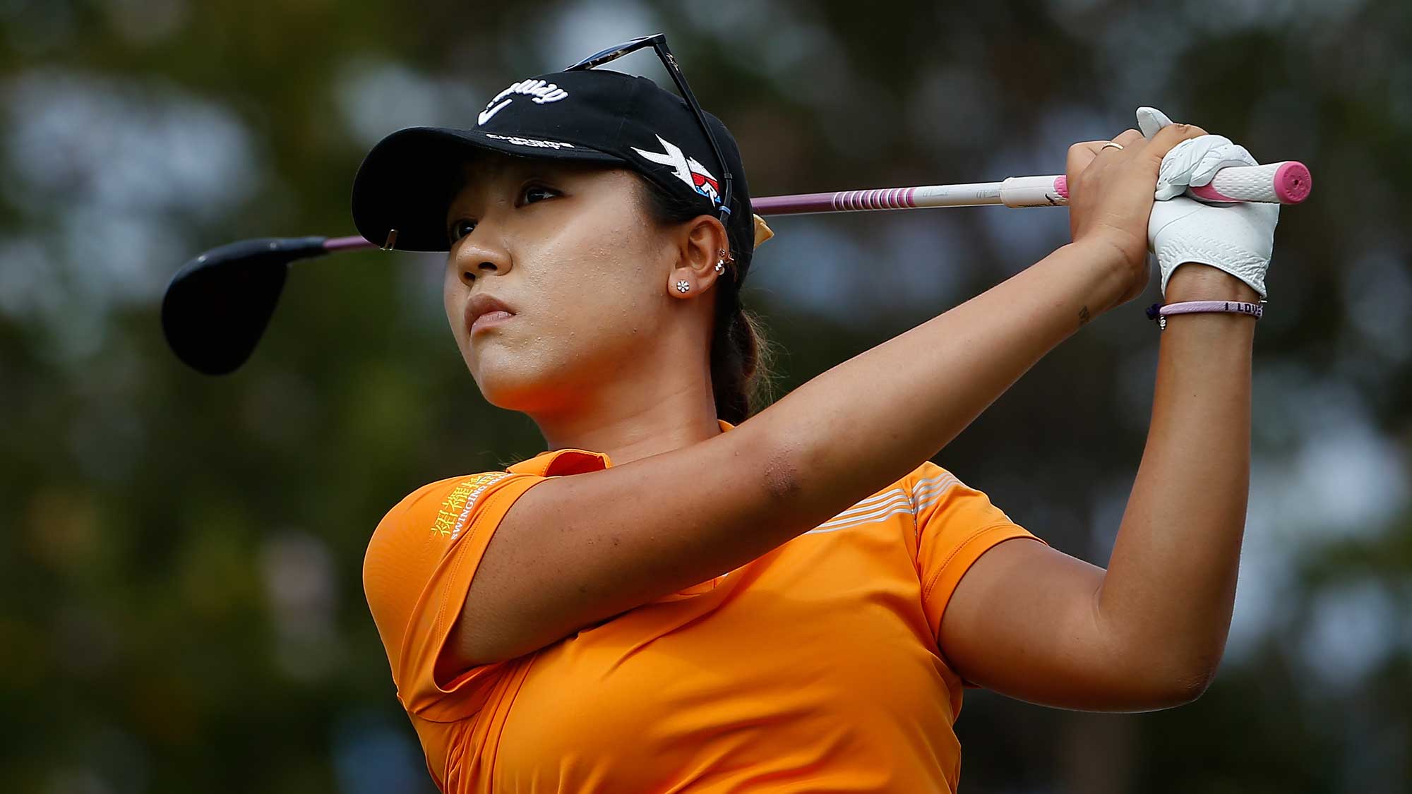 Lydia Ko of New Zealand plays a tee shot on the second hole during the fina...