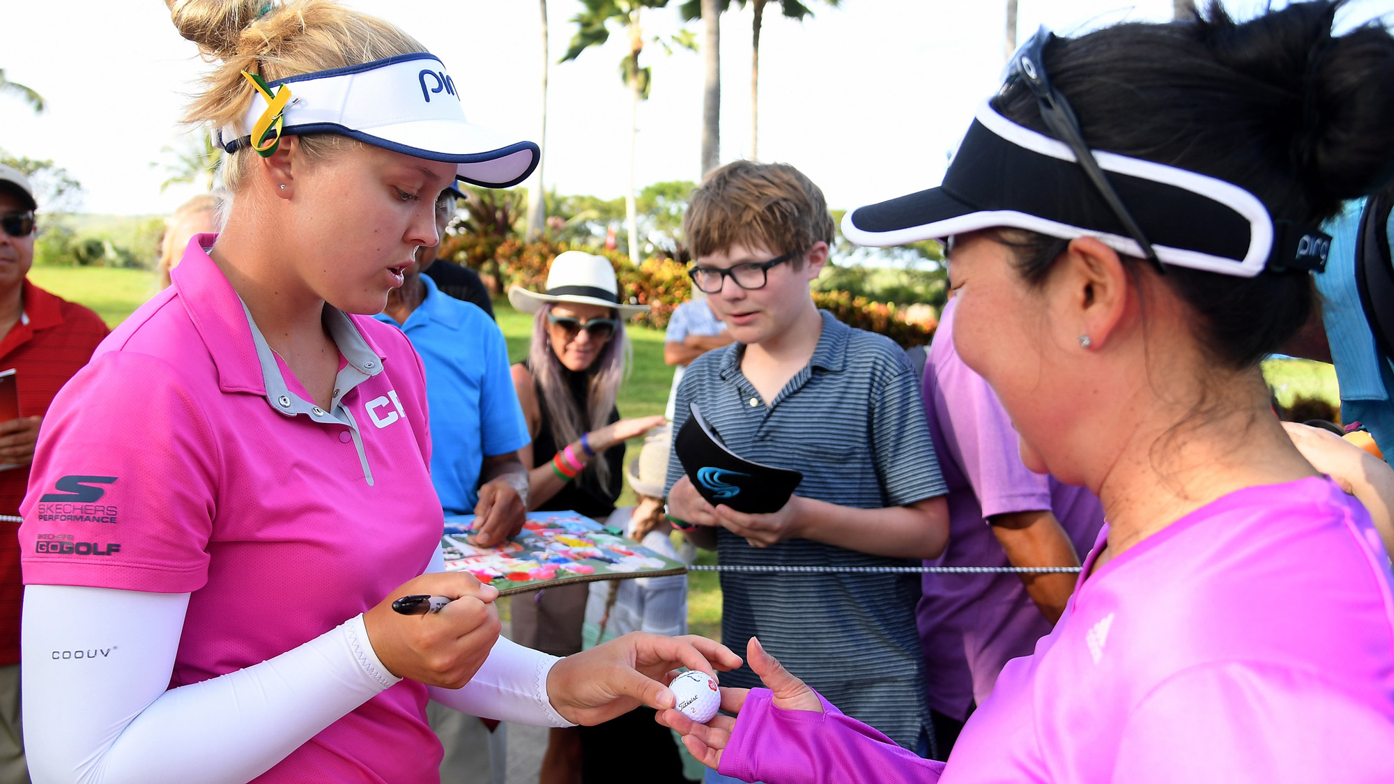 Brooke Signs an Autograph at the LOTTE Championship 