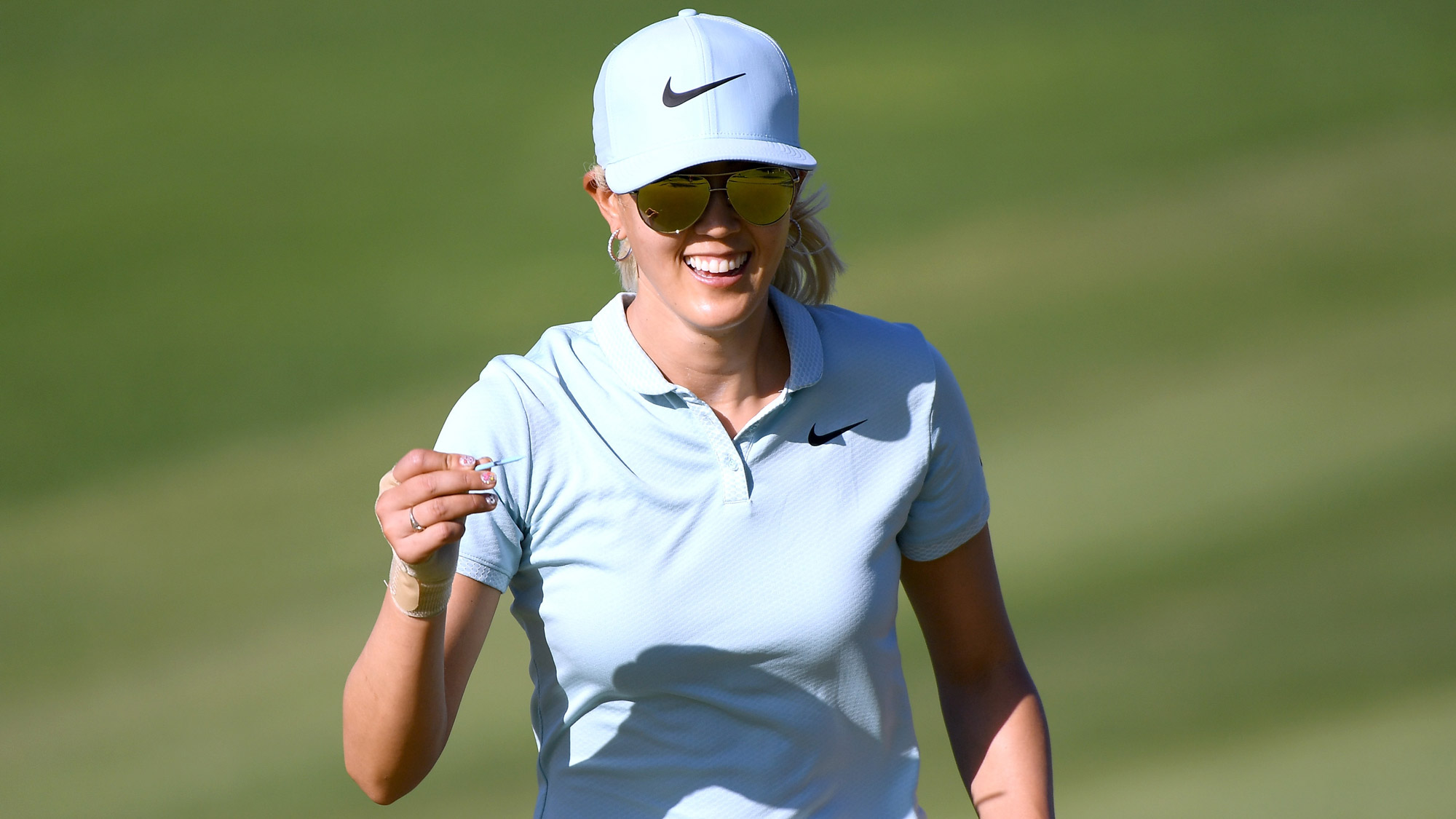 Michelle Wie Smiles in Round One in Hawaii