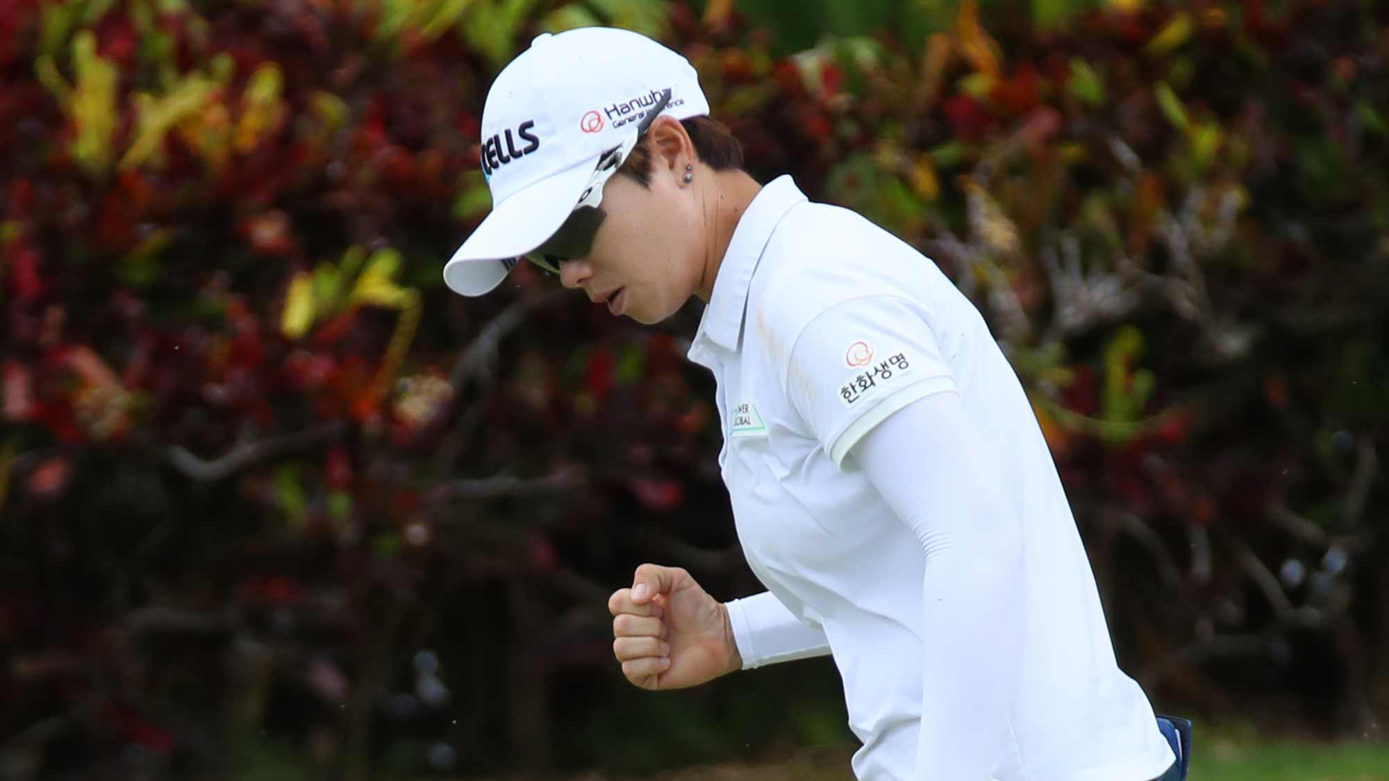  Eun-Hee Ji of South Korea reacts to a birdie on the 18th green during the first round of the Lotte Championship on April 18, 2019 in Kapolei, Hawaii.