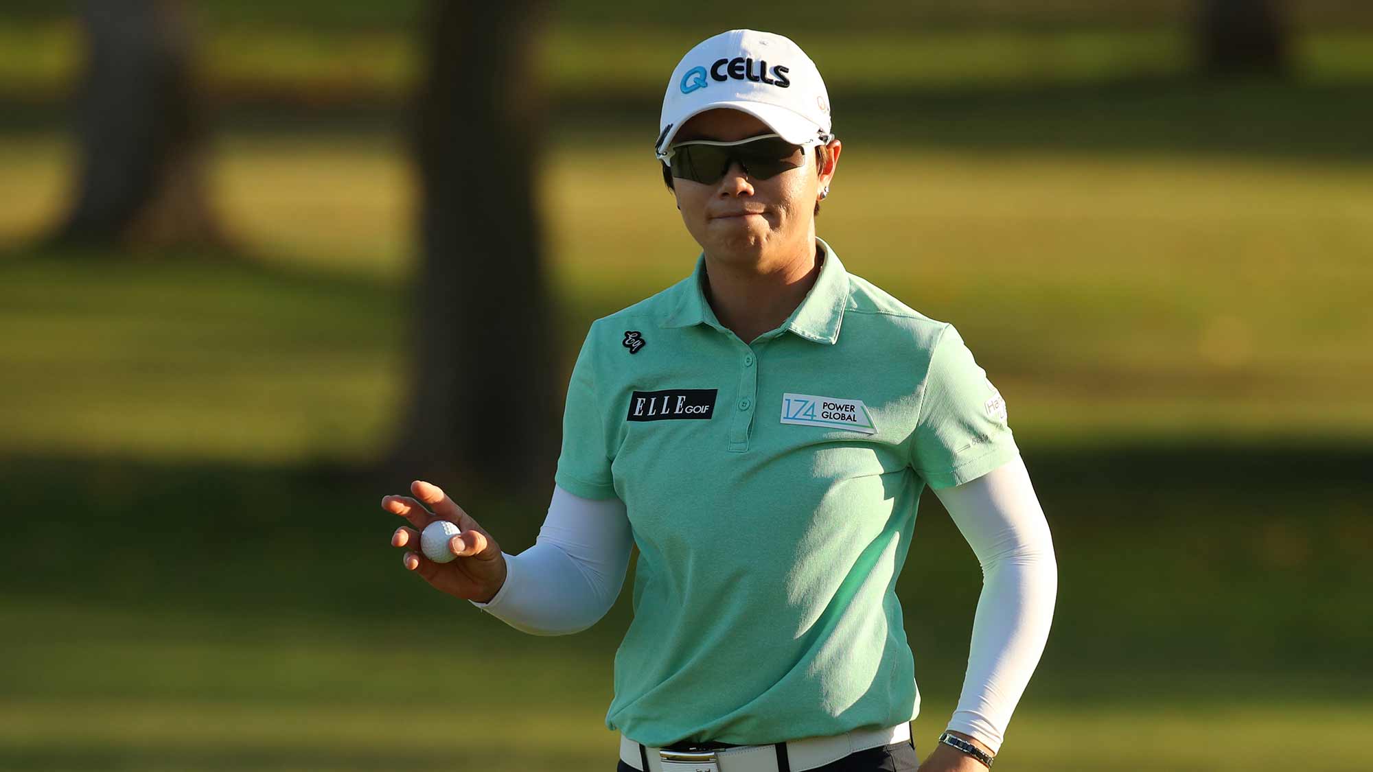 Eun-Hee Ji of South Korea waves to fans after a par on the ninth hole during the second round of the LOTTE Championship on April 19, 2019 in Kapolei, Hawaii