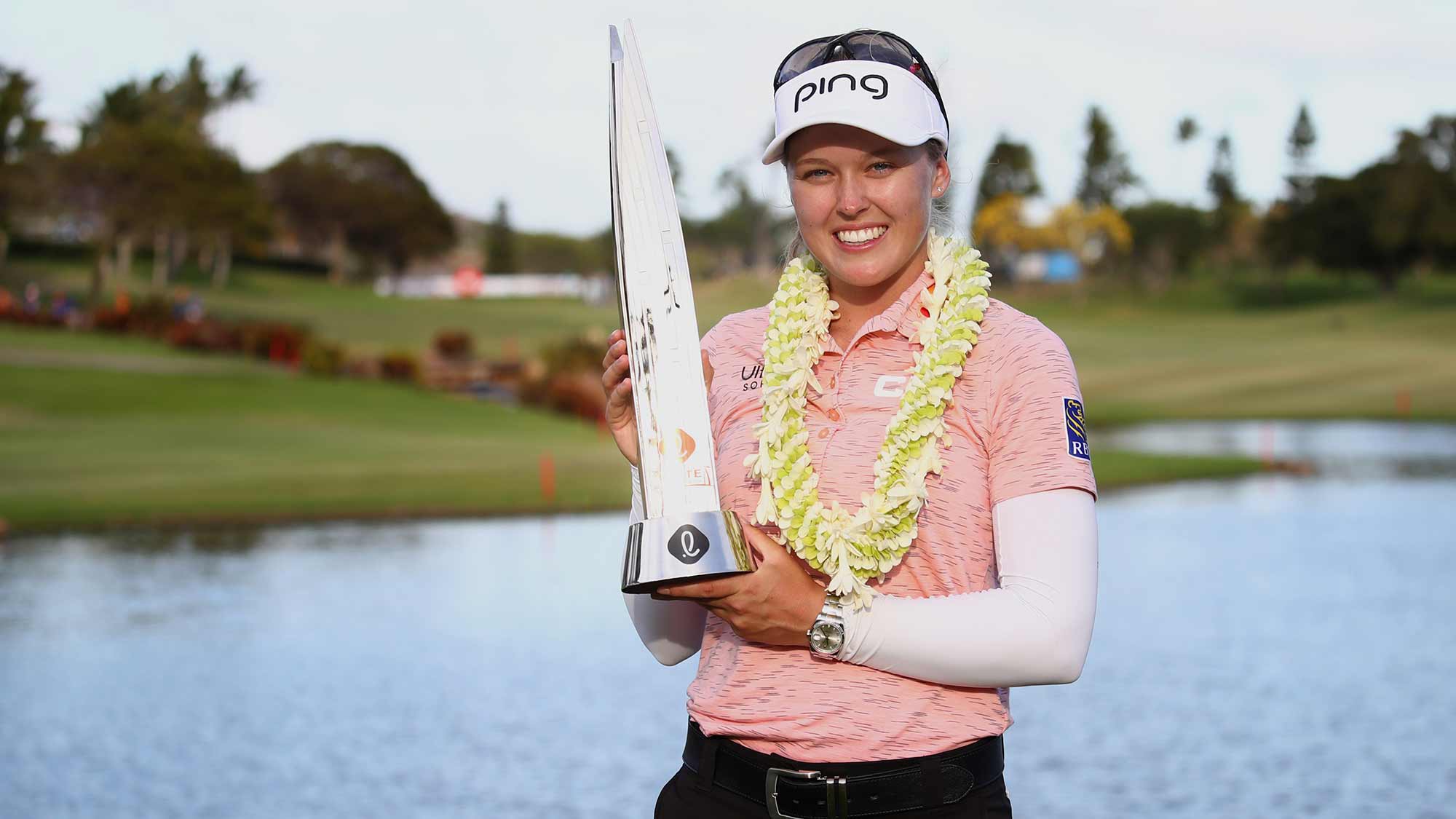Brooke Henderson poses with the trophy after winning the LOTTE Championship at Ko Olina Golf Club on April 21, 2019 in Kapolei, Hawaii