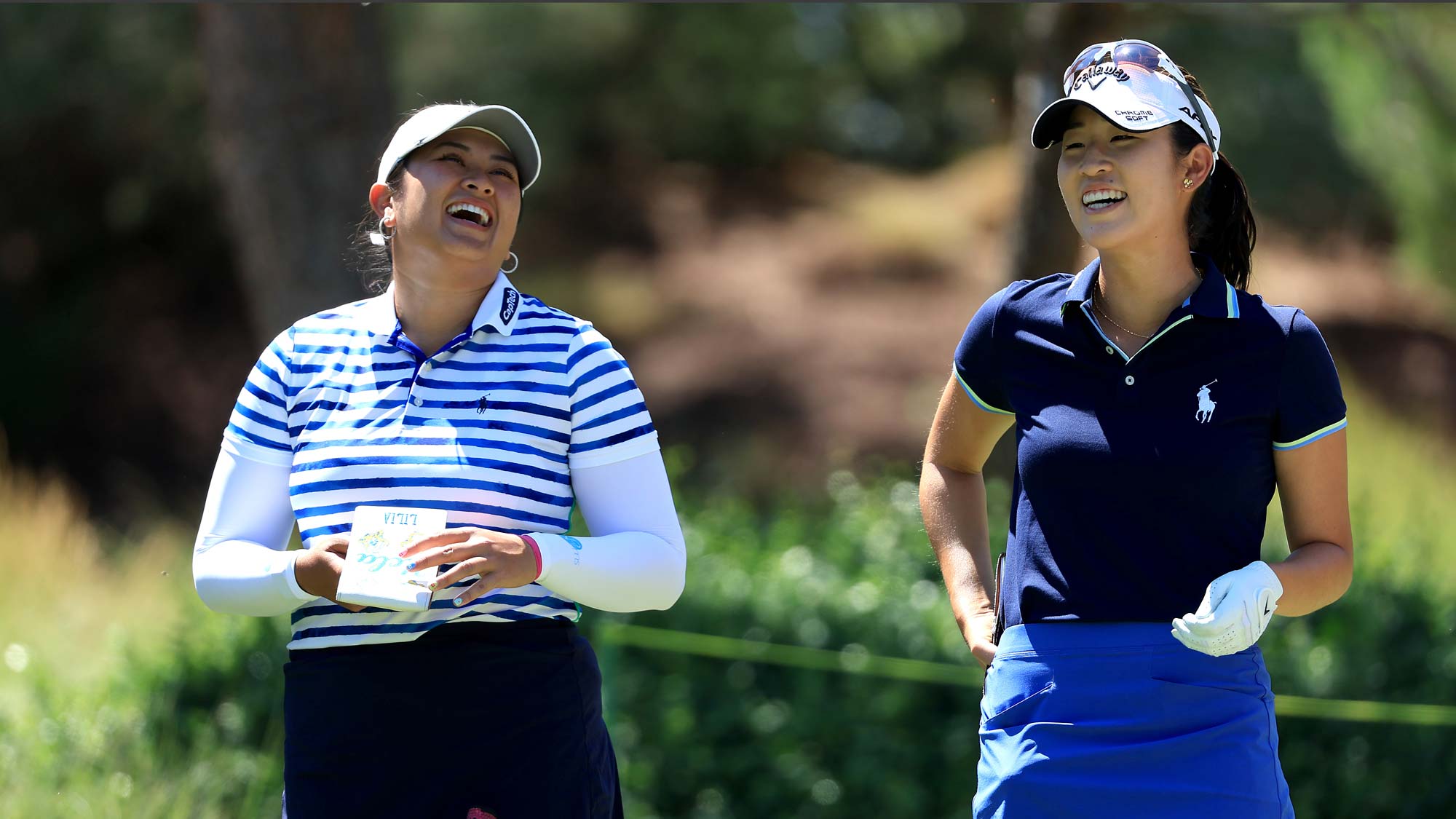 (L-R) Lilia Vu of the United States and Andrea Lee of the United States share a laugh at the second tee during the Bank of Hope LPGA Match-Play Hosted by Shadow Creek