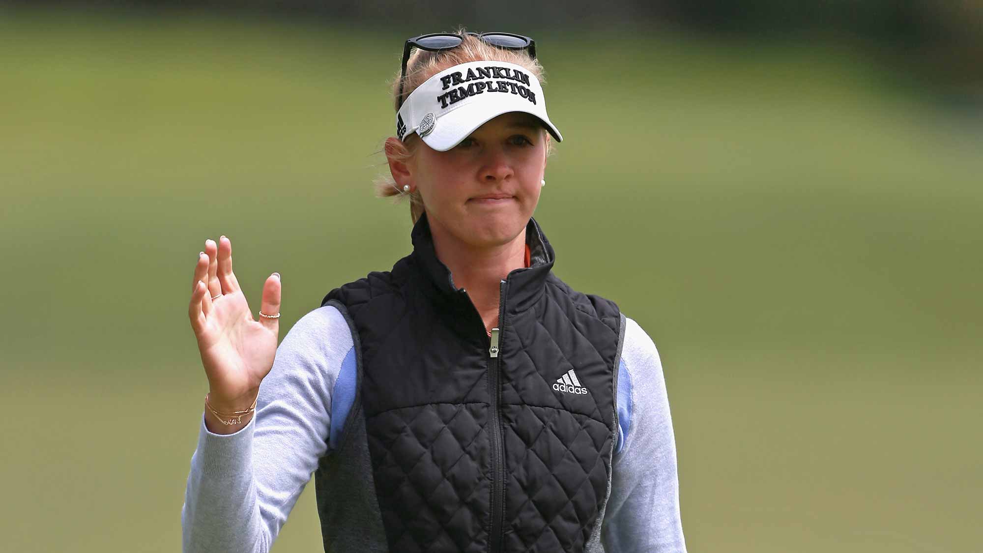 Jessica Korda waves to the gallery after making a birdie on the first hole during the third round of the LPGA MEDIHEAL Championship at Lake Merced Golf Club on April 28, 2018 in Daly City, California