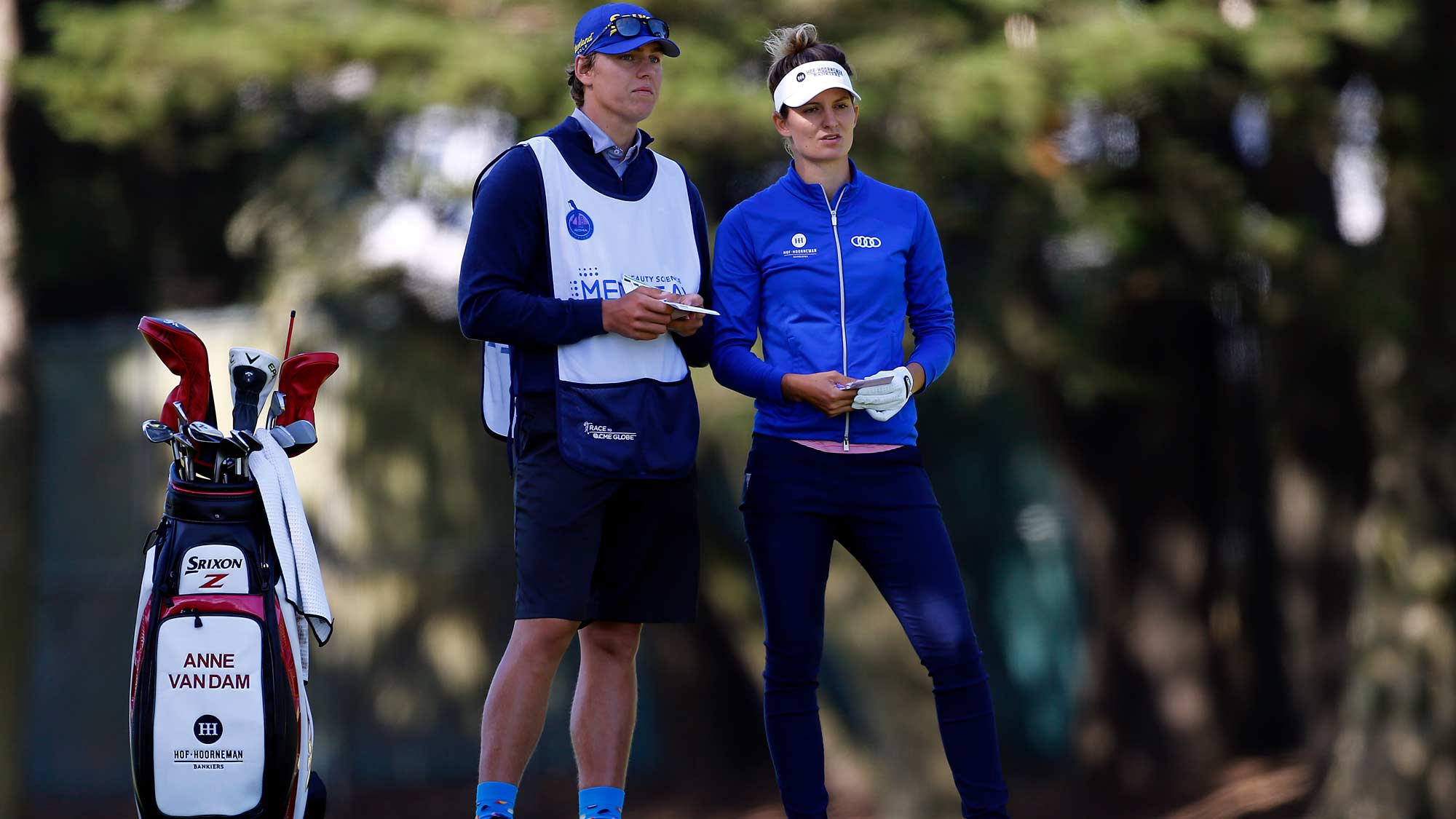 Anne van Dam of the Netherlands talks to her caddie on the 18th hole during the first round of the LPGA Mediheal Championship
