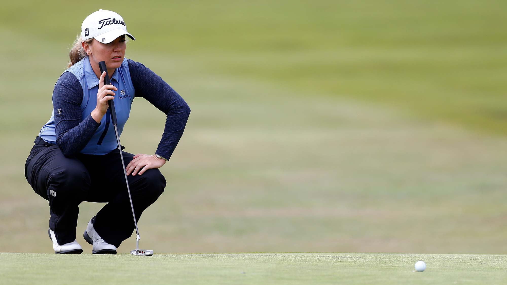 Bronte Law of England lines up a putt after on the 18th green during the final round of the LPGA Mediheal Championship