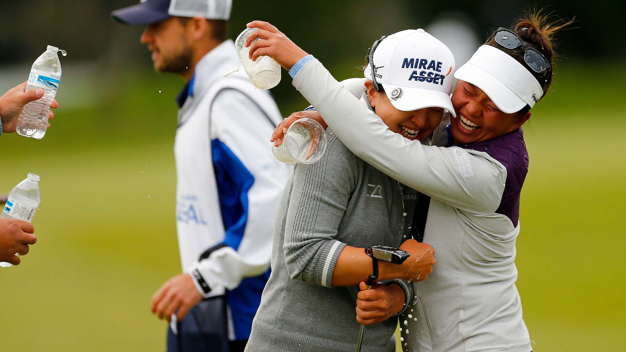 Sei Young Kim of South Korea is hugged by Meghan Kang after making a birdie putt in a sudden death playoff to win during the final round of the LPGA Mediheal Championship