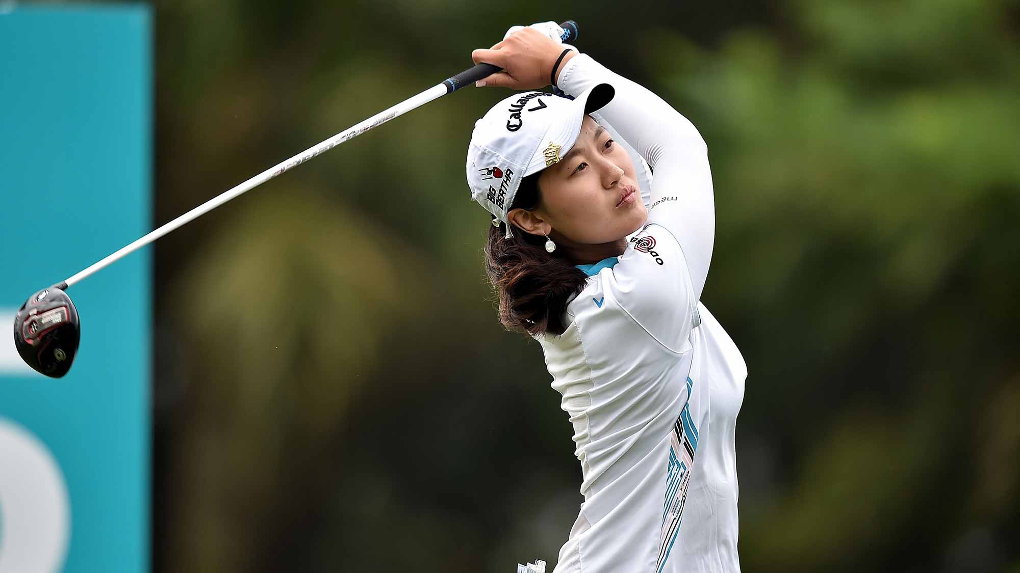Xi Yu Lin of Republic of China plays the shot during the round one of 2015 Fubon LPGA Taiwan Championship at Miramar Golf & Country Club