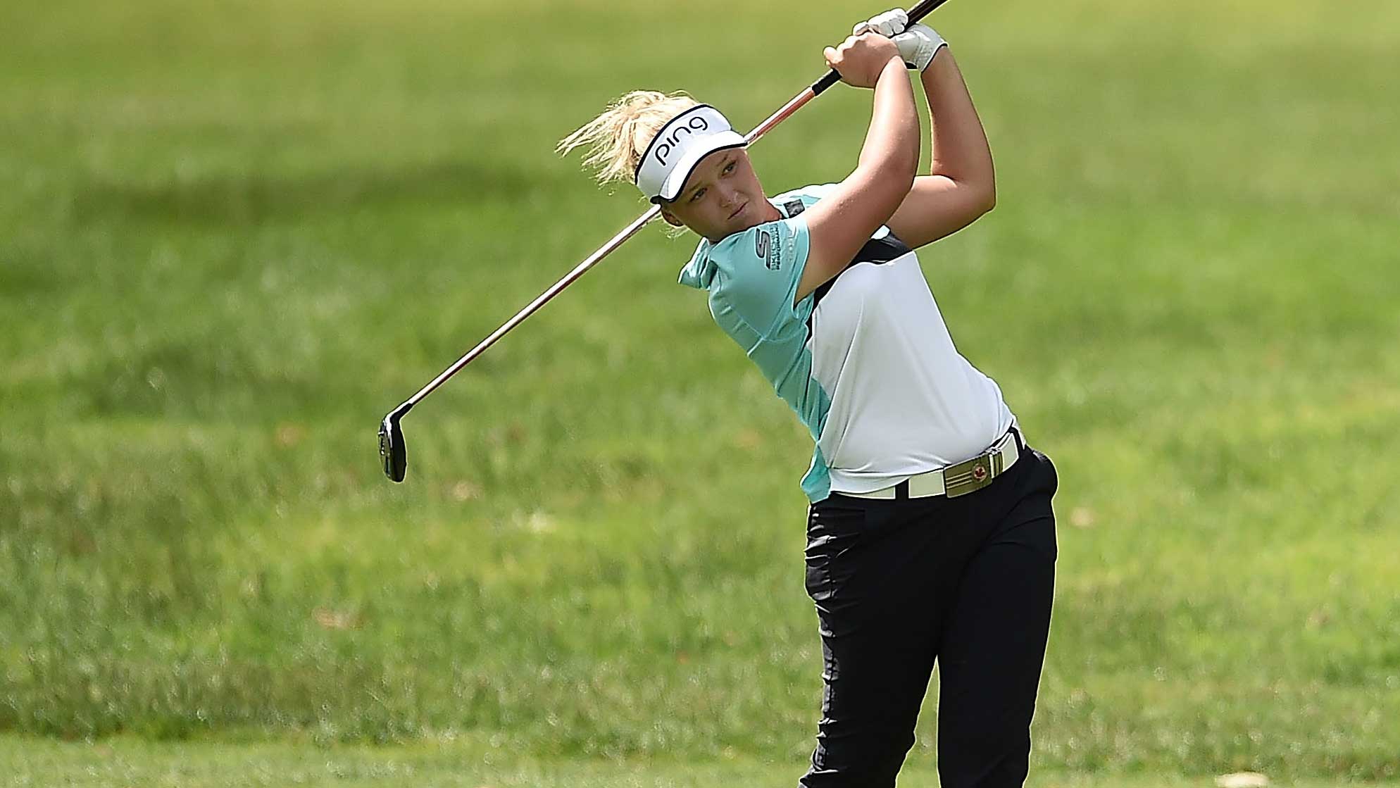 Brooke Henderson of Canada hits her second shot on the first hole during the final round of the Meijer LPGA Classic