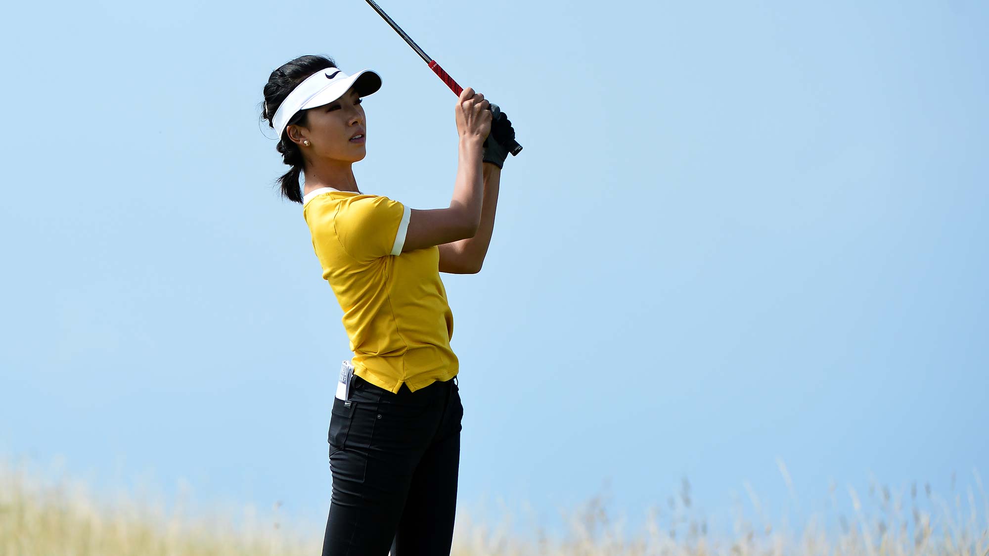 Muni He of China plays her tee shot to the 3rd hole during the Aberdeen Standard Investment Scottish Open
