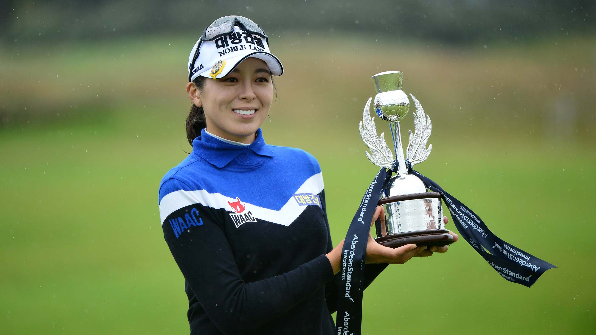 Mi Jung Hur of Korea lifts the trophy as she wins the Aberdeen Standard Investment Scottish Open