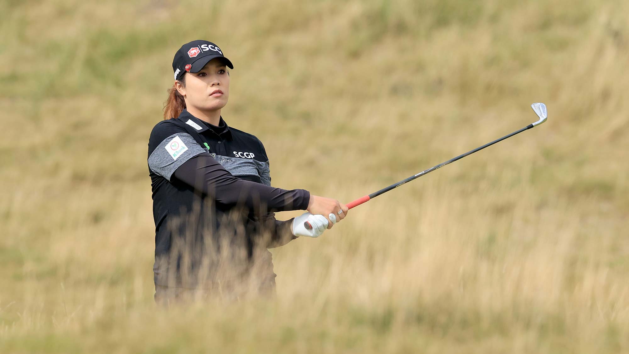Ariya Jutanugarn of Thailand plays her second shot on the 13th hole during the final round of the Trust Golf Women's Scottish Open