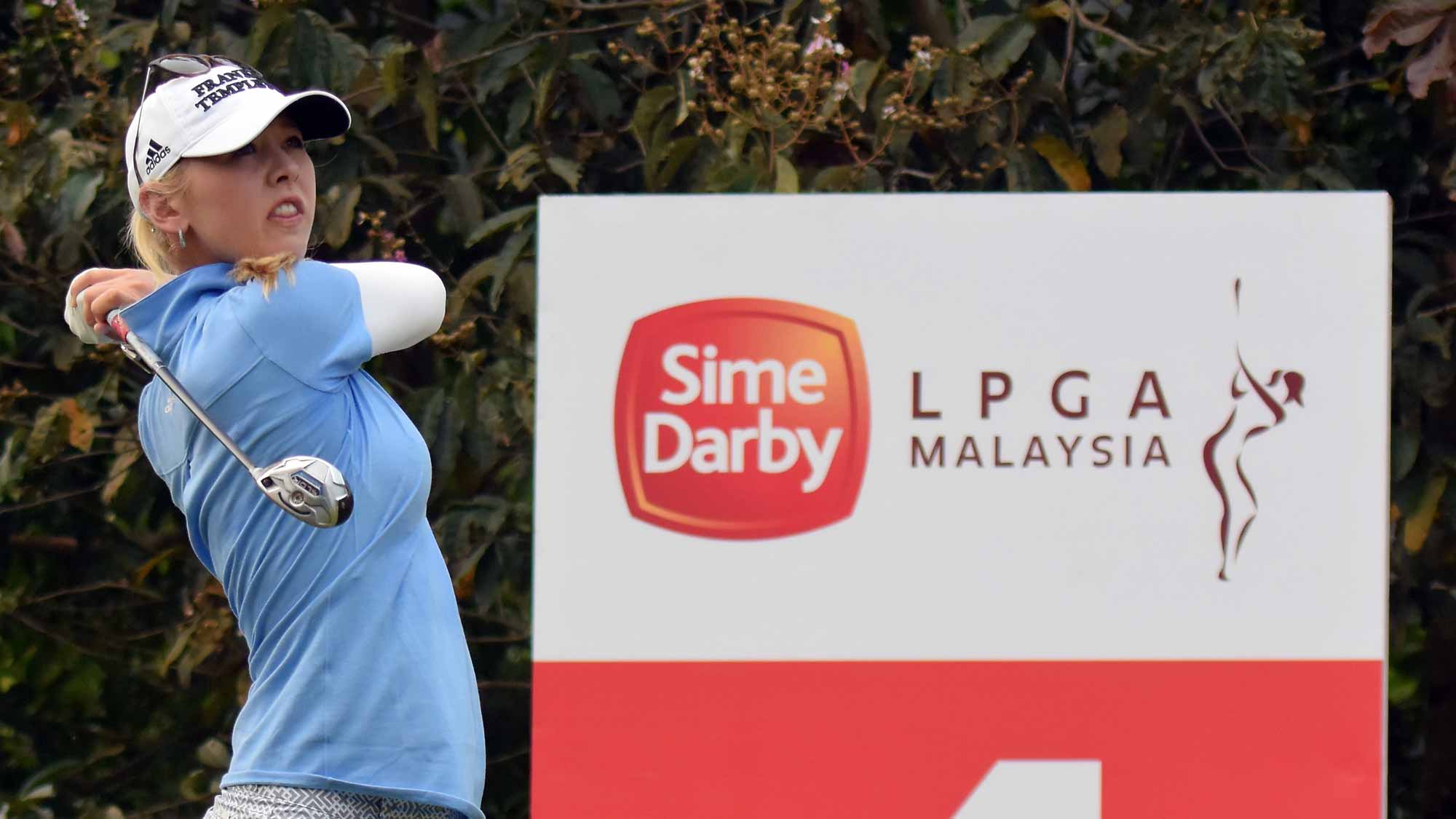 Jessica Korda of the USA watches her tee shot on the 1st hole during the final round of the Sime Darby LPGA Tour at Kuala Lumpur Golf & Country Club