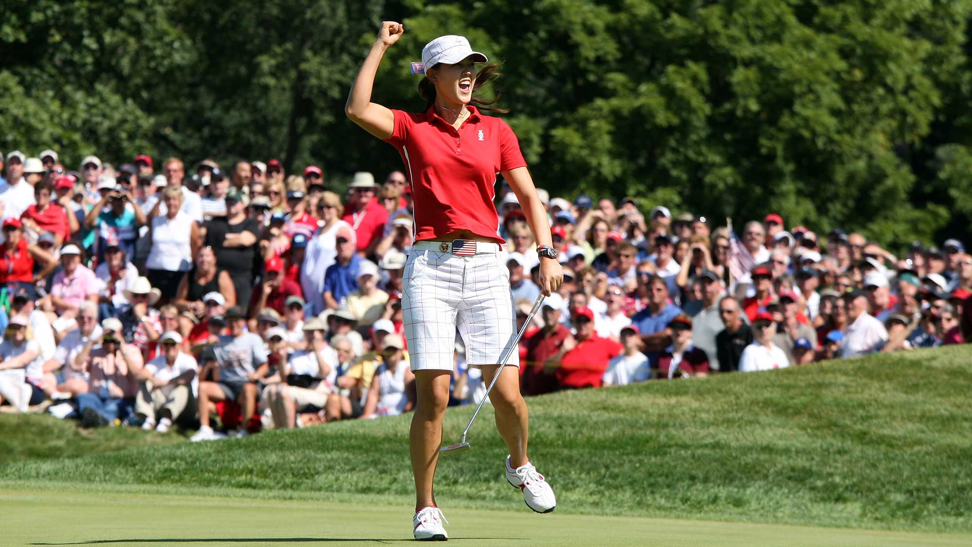 Michelle Wie of the USA birdies the third hole during the Sunday singles matches at the 2009 Solheim Cup Matches