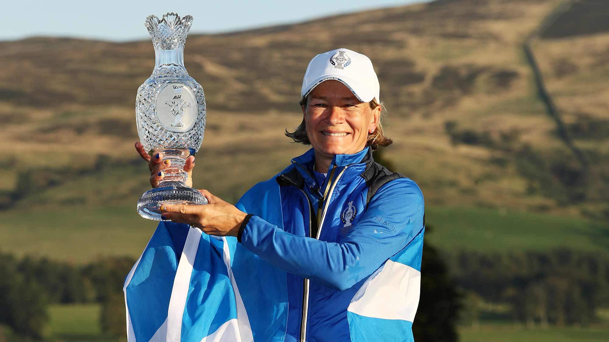 Team Europe captain Catriona Matthew celebrates her teams win with the Solheim Cup during the final day singles matches of the Solheim Cup at Gleneagles on September 15, 2019 in Auchterarder, Scotland