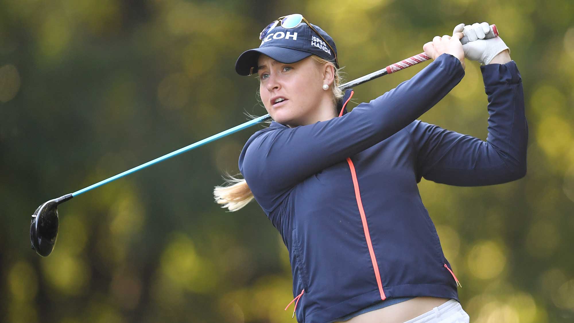 Charley Hull of Great Britain hits her tee shot on the 2nd hole during the final round of the TOTO Japan Classic