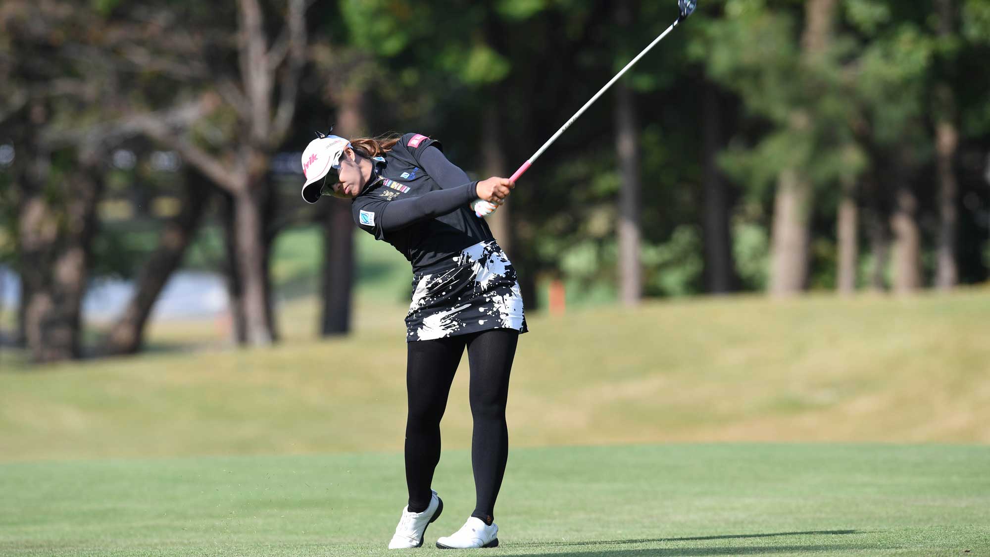 Pornanong Phatlum of Thailand hits her second shot on the 12th hole during the final round of the TOTO Japan Classic