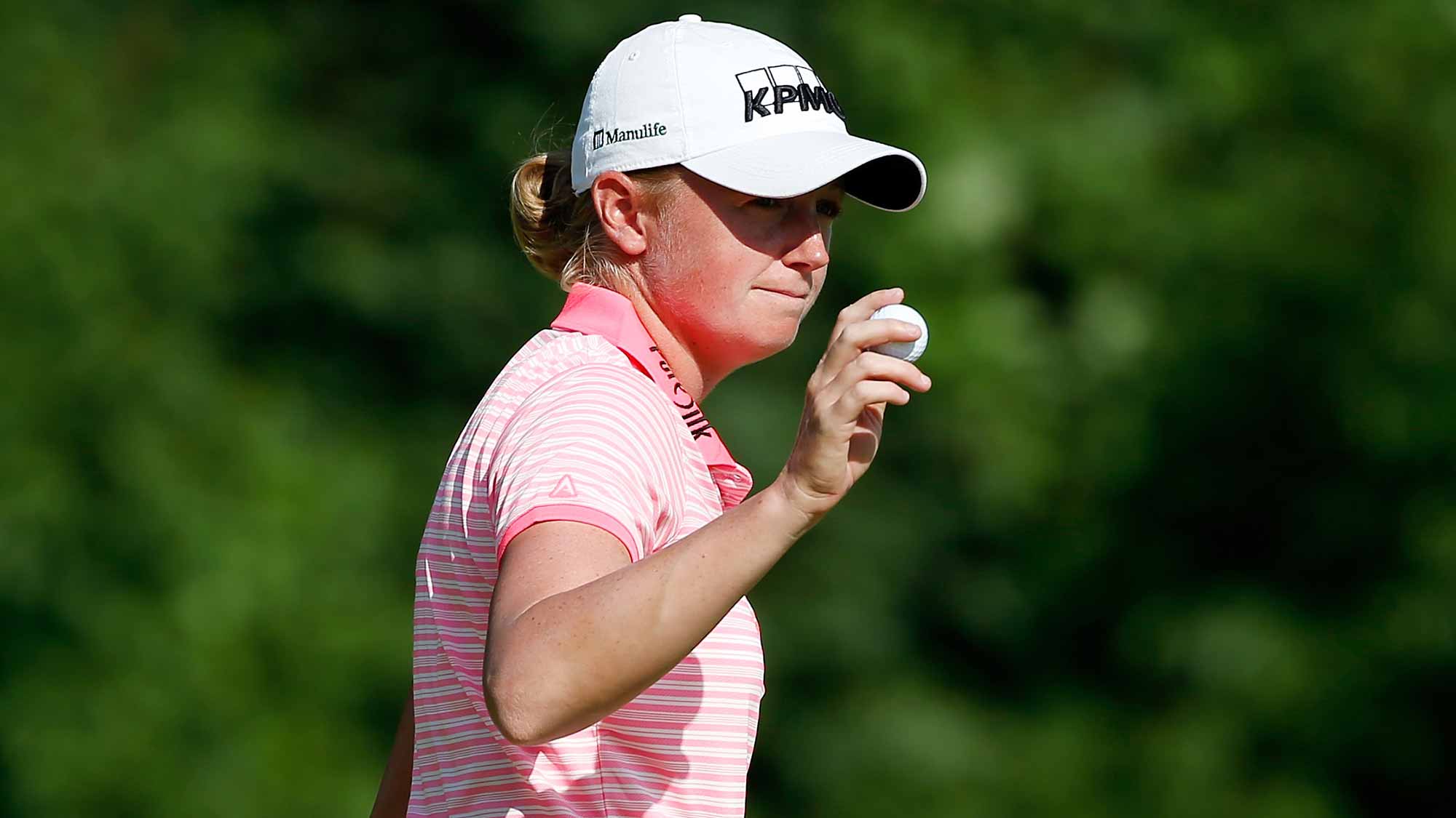 Stacy Lewis of the United States waves to the gallery on the third hole after a birdie putt during the second round of the U.S. Women's Open at Lancaster Country Club