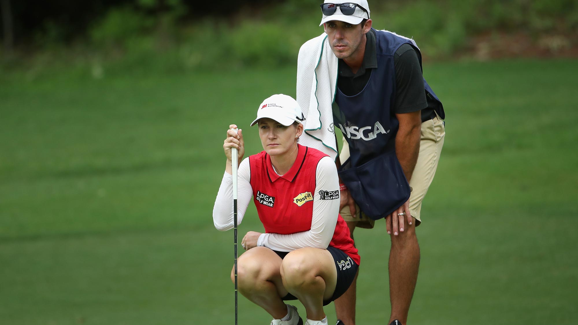 Sarah Jane Smith of Australia sand caddie/husband Duane Smith look over the 15th green during the second round of the 2018 U.S. Women's Open