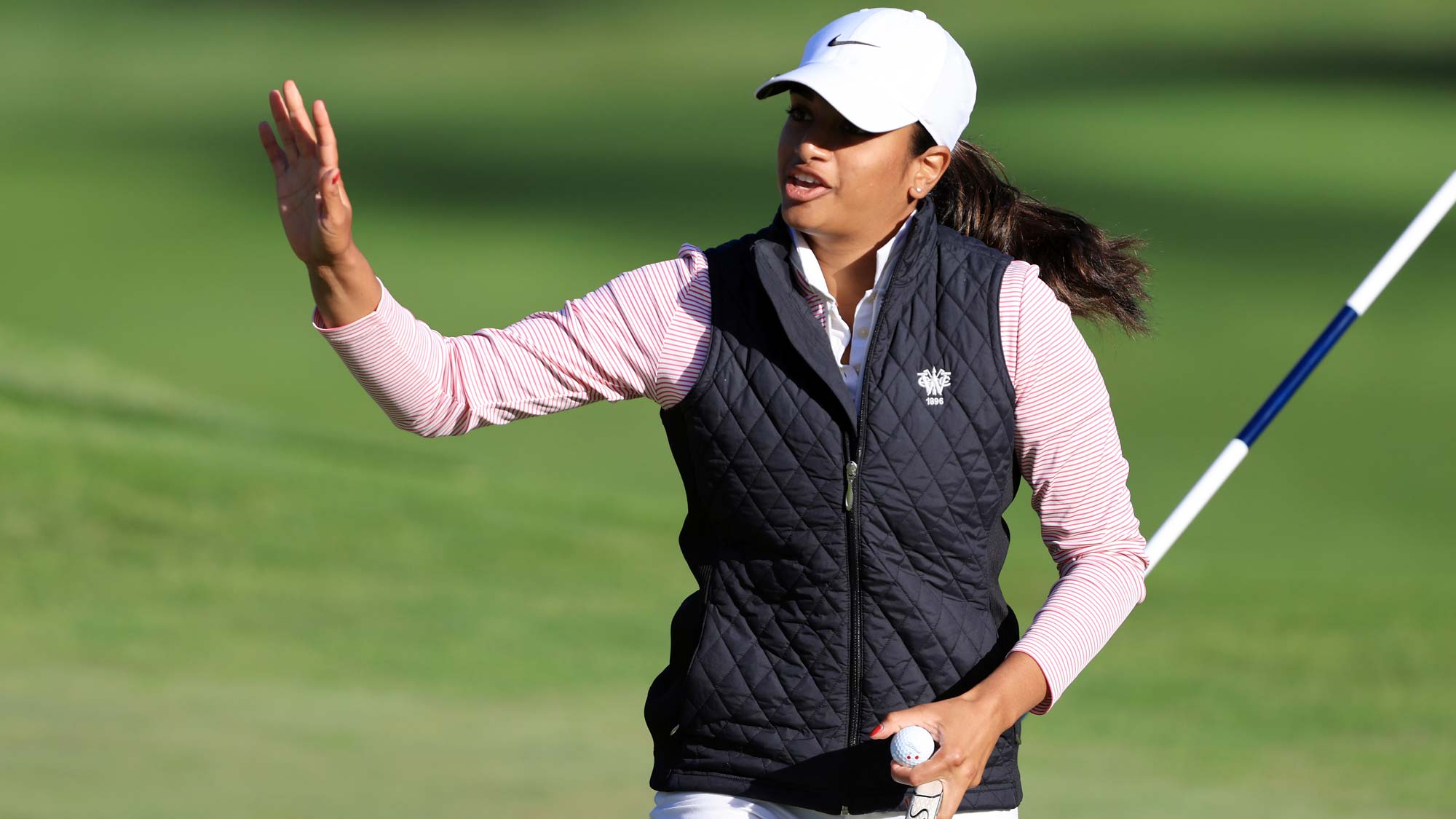Megha Ganne reacts after finishing on the 18th hole during the first round of the 76th U.S. Women's Open Championship