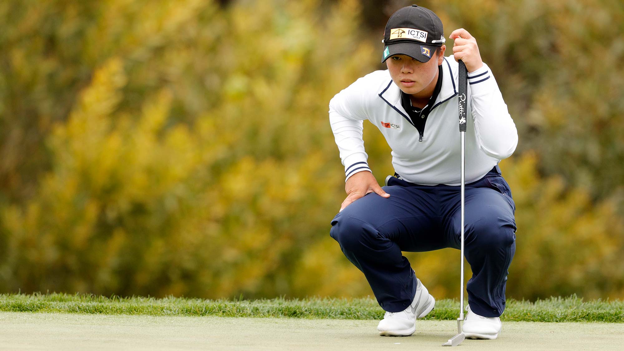 Yuka Saso of the Philippines lines up her putt on the 15th hole during the second round of the 76th U.S. Women's Open Championship