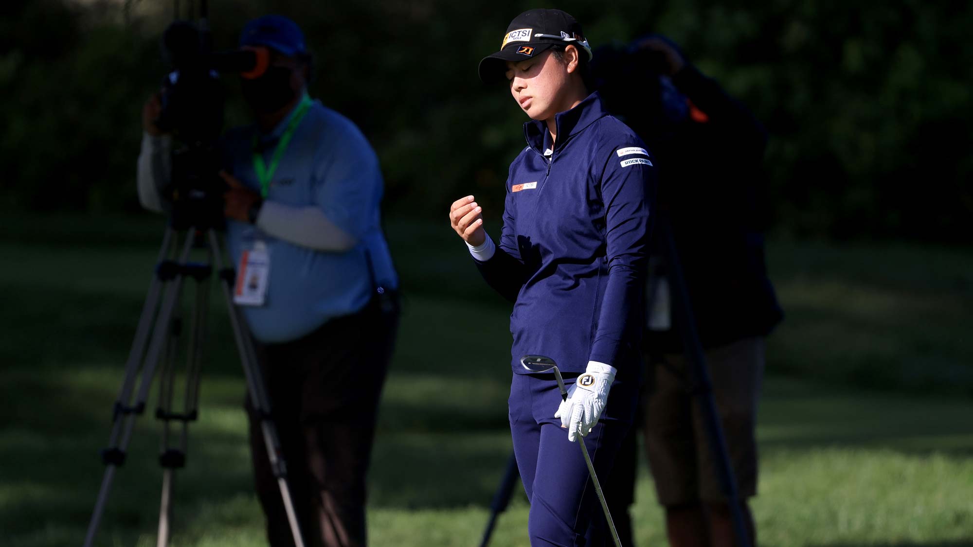 Yuka Saso of the Philippines reacts to a chip shot on the 14th hole green during the third round of the 76th U.S. Women's Open Championship 