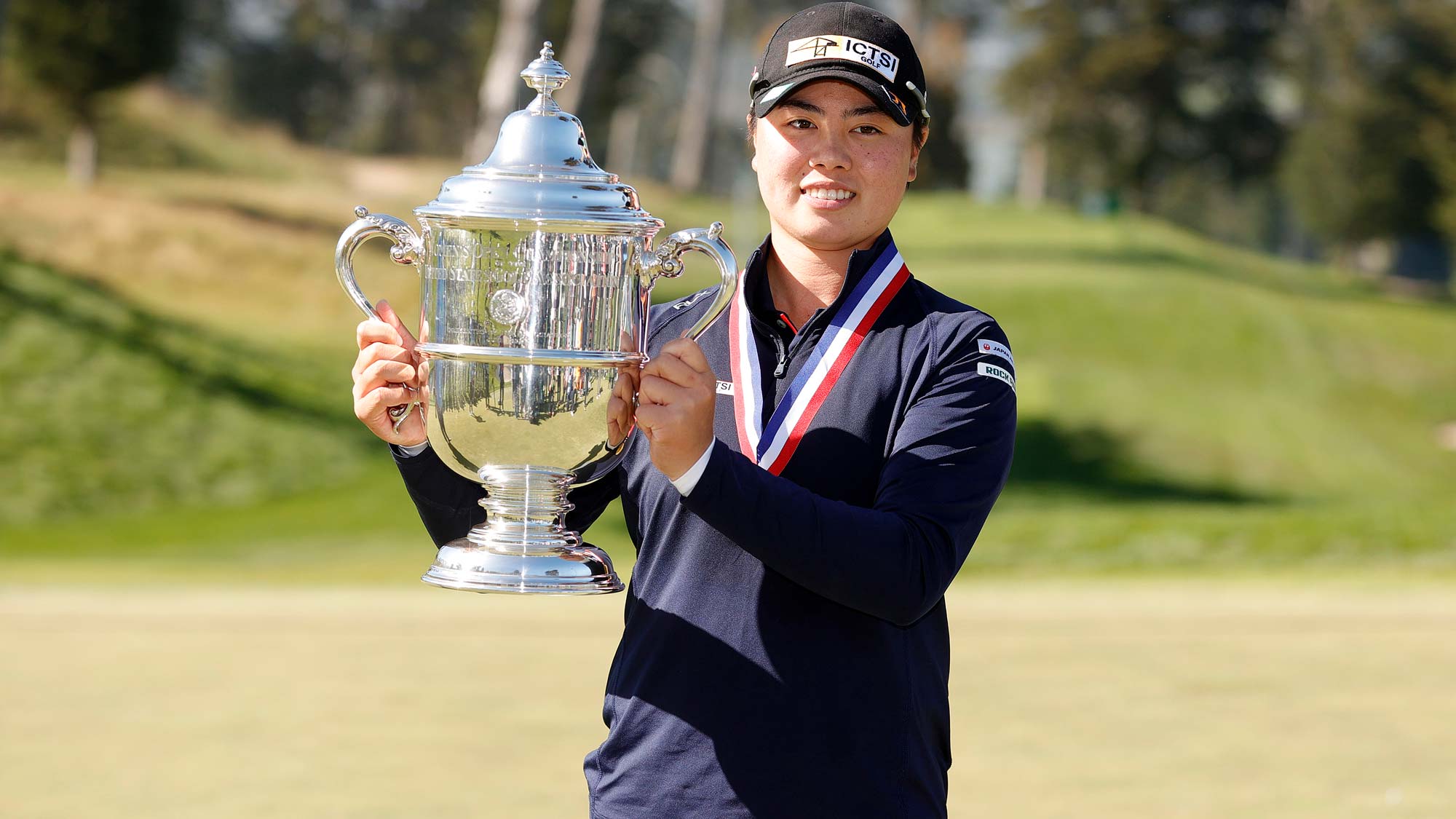 Yuka Saso of the Philippines celebrates with the Harton S. Semple Trophy after winning the 76th U.S. Women's Open Championship