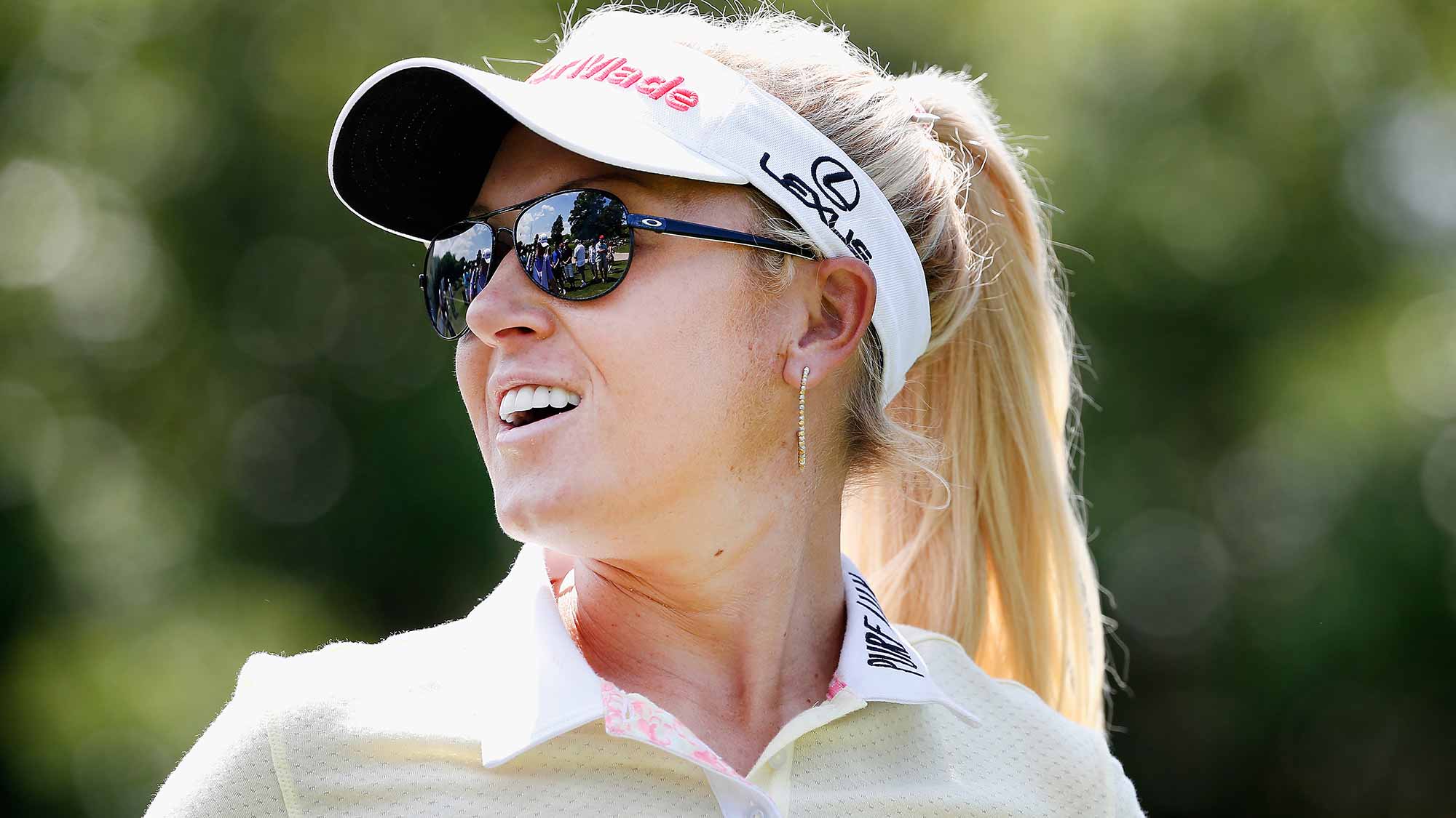 Natalie Gulbis reacts to a shot on the 18th hole during Round One of the 2015 Volunteers of America North Texas Shootout Presented by JTBC at Las Colinas Country Club