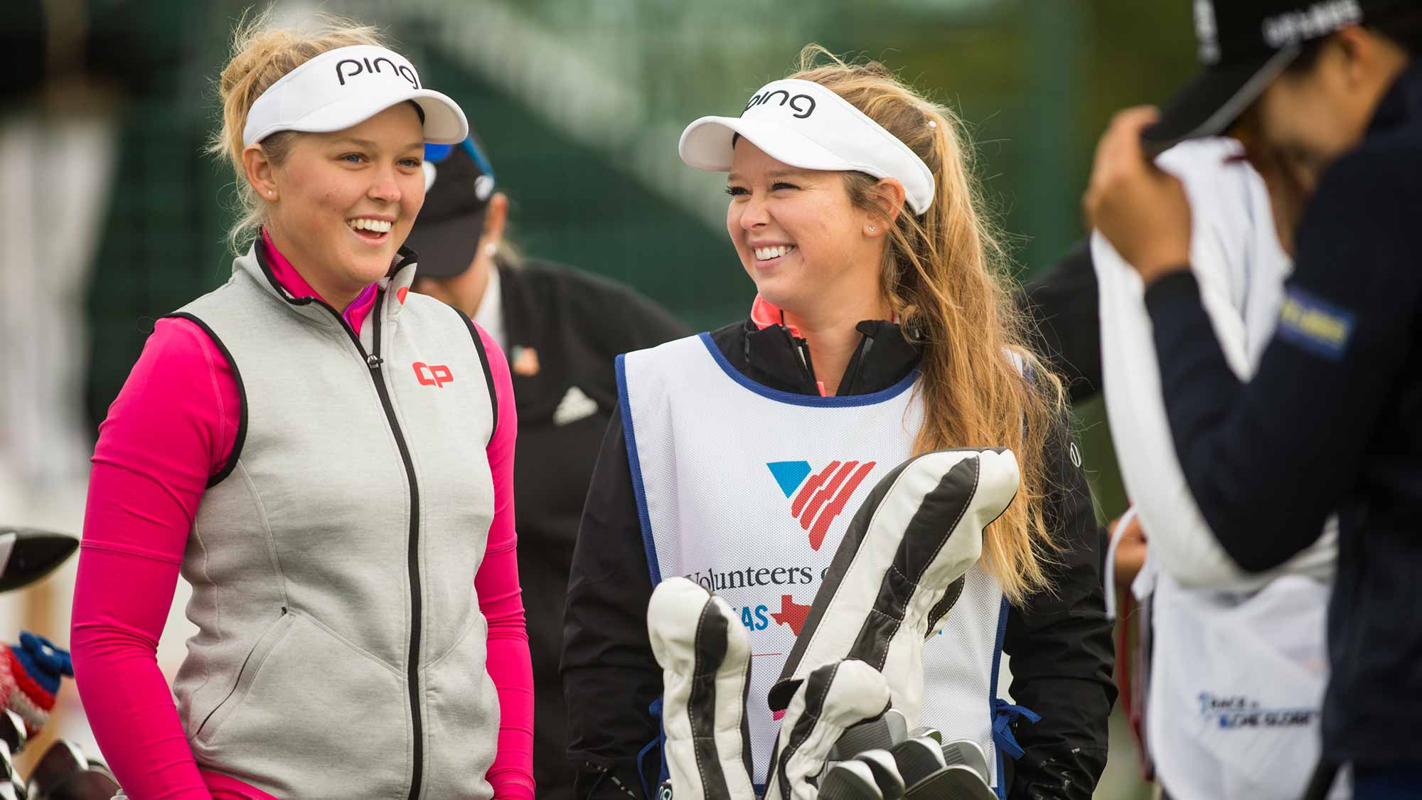Brooke Henderson of Canada and her caddie Brittany Henderson talk at the first tee prior to the first round of the Volunteers of America Texas Shootout at Las Colinas Country Club