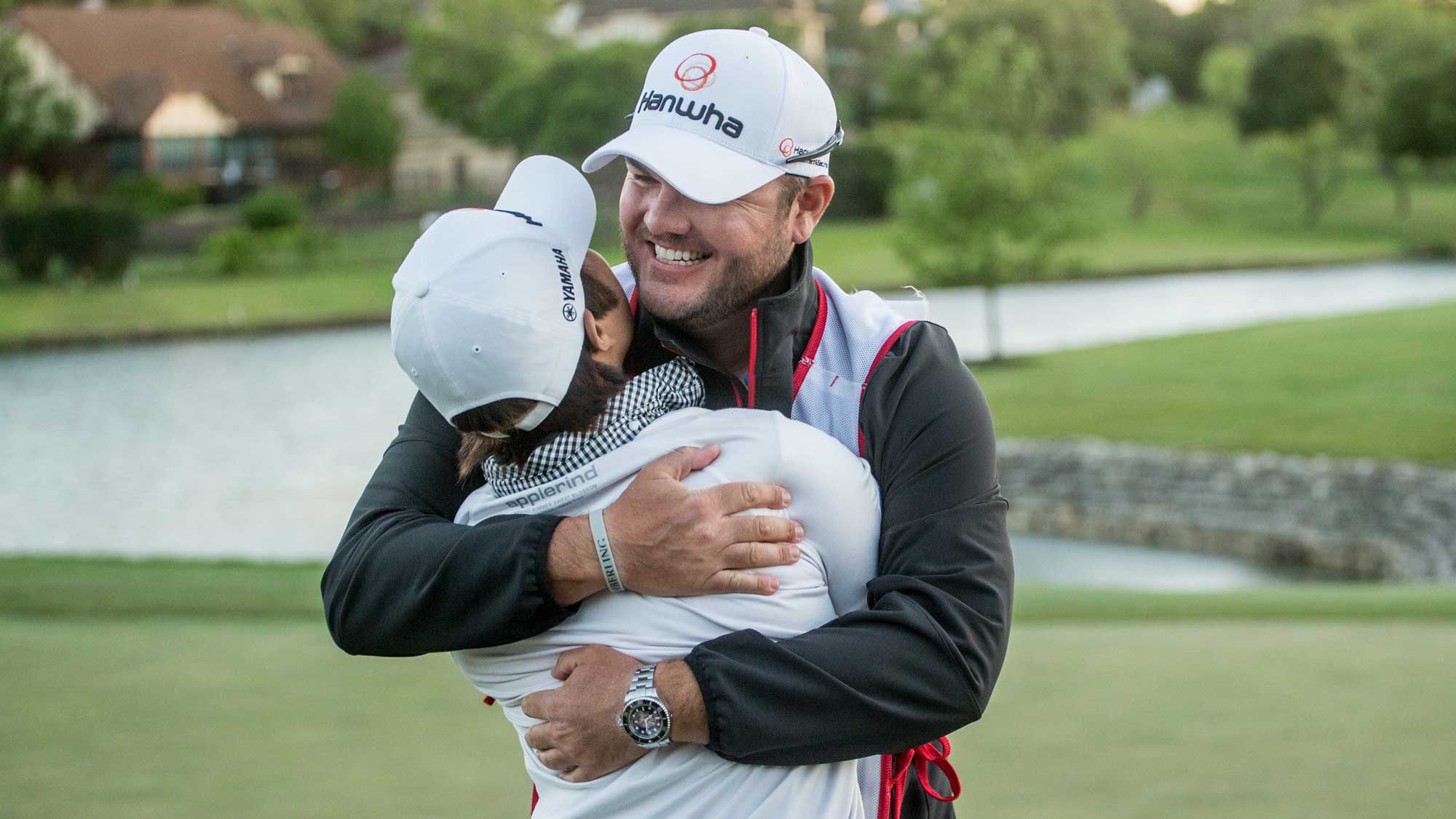 Haru Nomura of Japan is embraced by her caddie Jason McDede, following her victory at the Volunteers of America Texas Shootout 