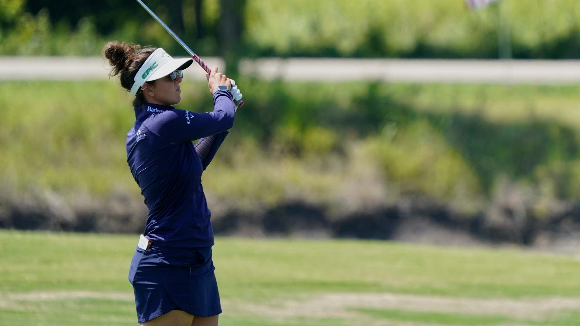 Emma Talley watches her approach shot on the 18th hole during the first round of the Volunteers of America Classic