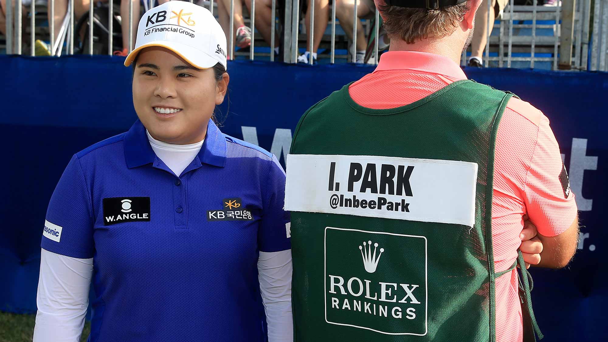 Inbee Park of South Korea poses with her caddie Brad Beecher. Park moved to first place in the Rolex Rankings prior to the first round of the Walmart NW Arkansas Championship Presented by P&G at Pinnacle Country Clu
