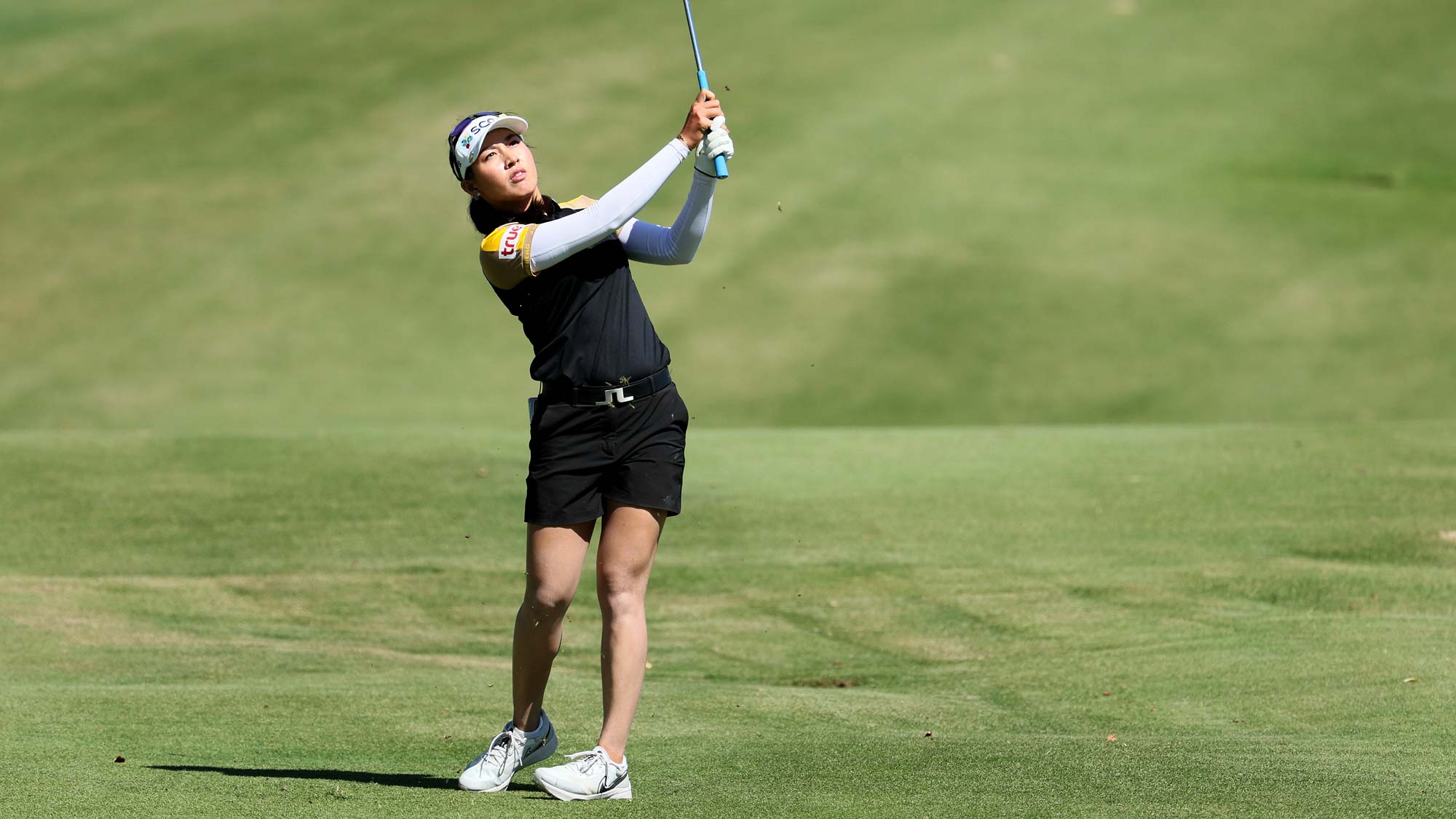 Atthaya Thitikul of Thailand hits her third shot on the 18th hole during the final round of the Walmart NW Arkansas Championship Presented by P&G