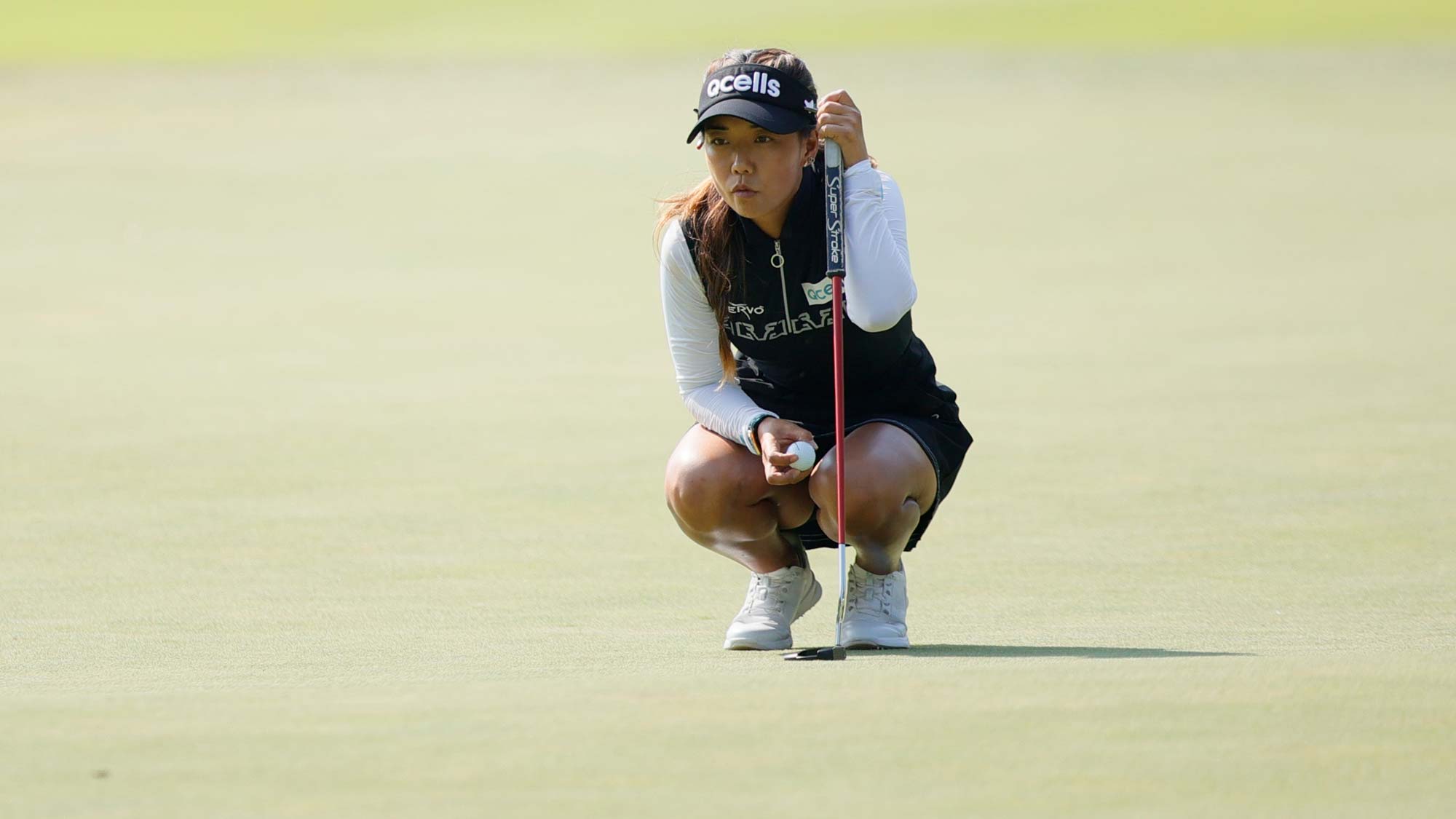 Jenny Shin of South Korea lines up her putt on the eighth green during the Final round of the Walmart NW Arkansas Championship presented by P&G at Pinnacle Country Club