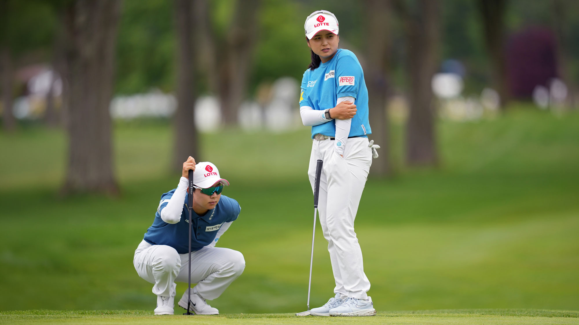 Hyo Joo Kim and Hye-Jin Choi of South Korea look on from the 10th green during the final round of the Dow Championship 2026 at Midland Country Club on June 14, 2026 in Midland, Michigan.
