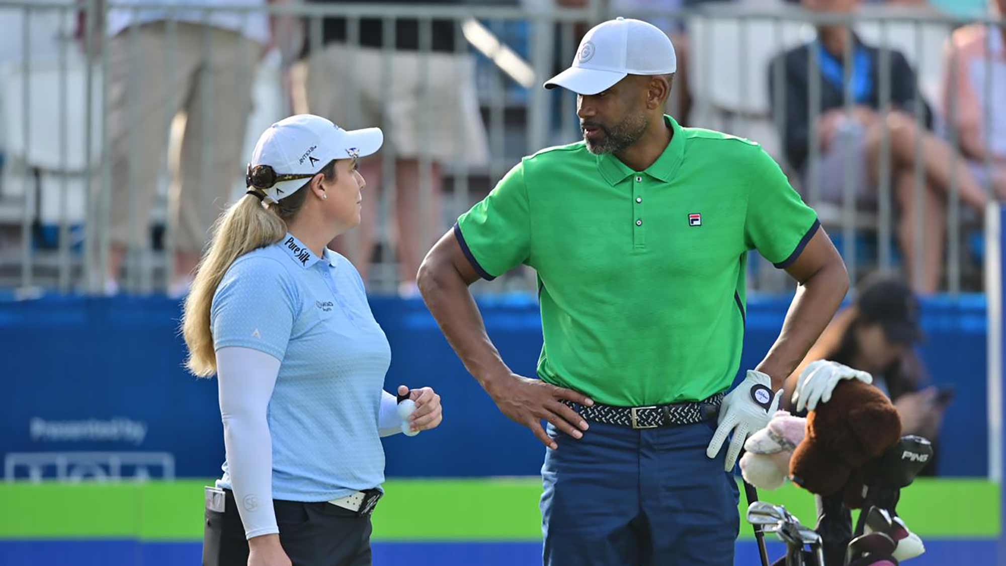 Brittany Lincicome talks with Grant Hill during the opening round of the Diamond Resorts Tournament of Champions presented by Insurance Office of America on January 16, 2020