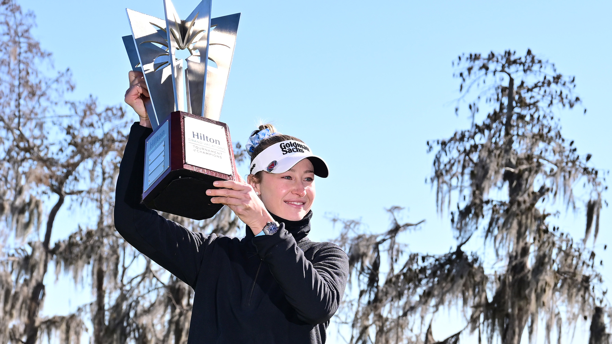Nelly Korda of the United States poses with the trophy following the completion of the third round of the Hilton Grand Vacations Tournament of Champions 2026 at Lake Nona Golf & Country Club on February 1, 2026 in Orlando, Florida. The tournament was shortened to 54 holes due to adverse weather conditions.