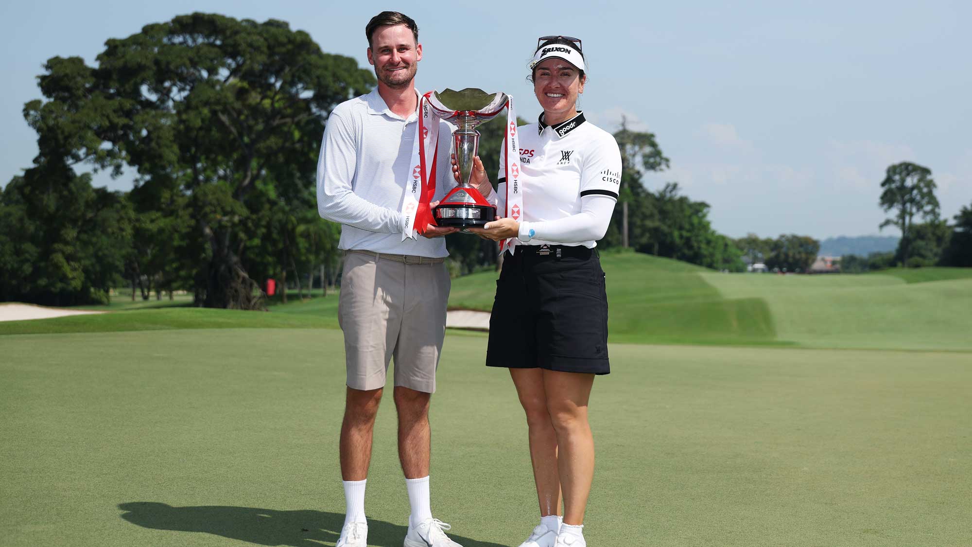 Hannah Green and her caddie Jarryd Felton