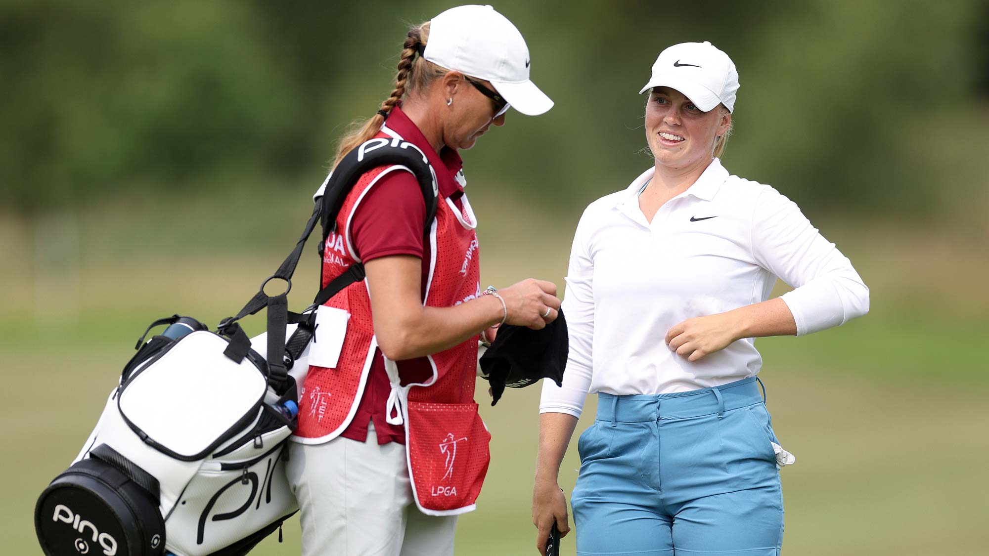 Maja Stark of Sweden talks to their caddie on the 2nd hole during Day Four of the ISPS Handa World Invitational presented by AVIV Clinics