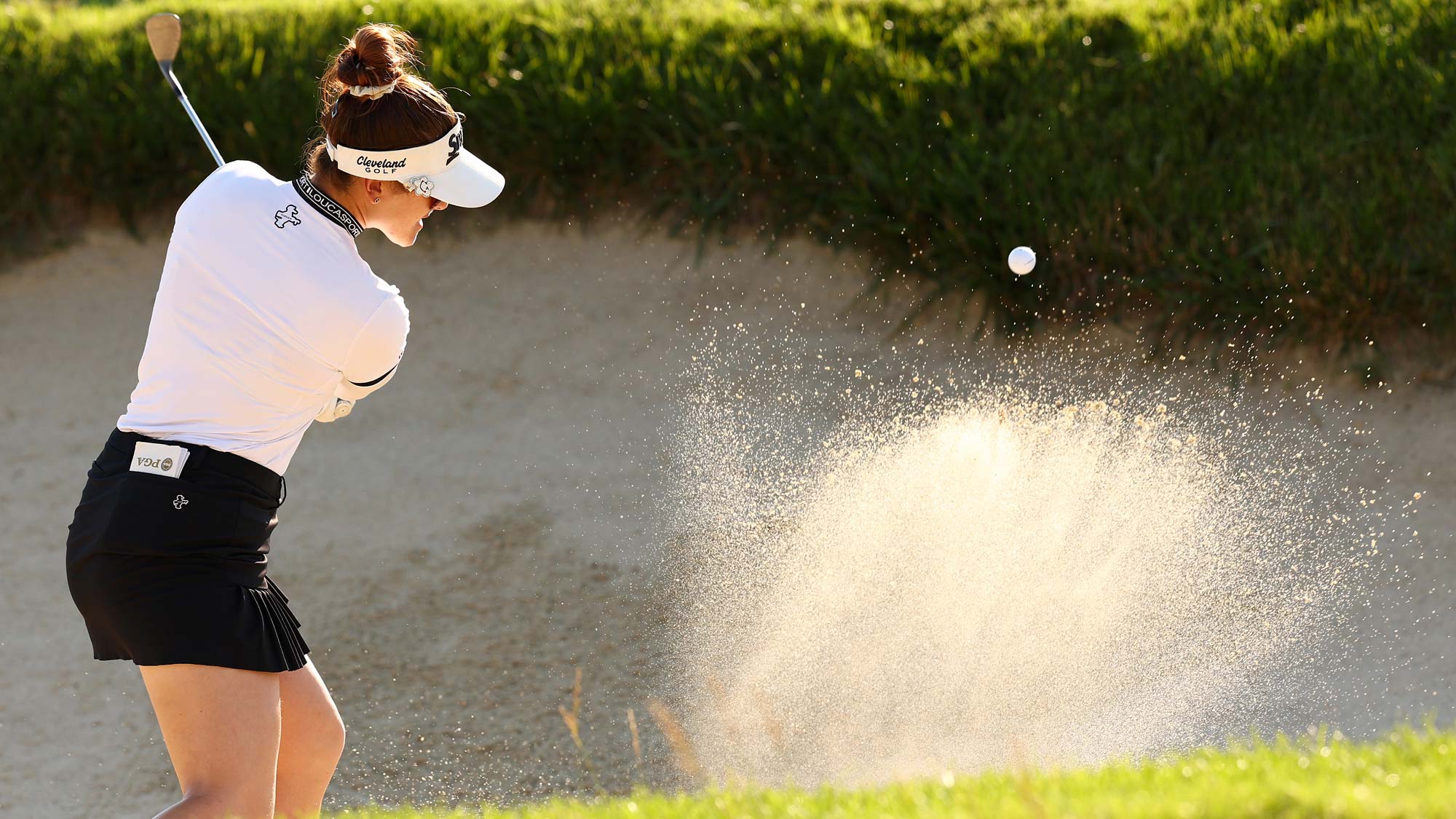 Hannah Green of Australia plays a shot from a bunker on the eighth hole during the second round of the KPMG Women's PGA Championship at Congressional Country Club