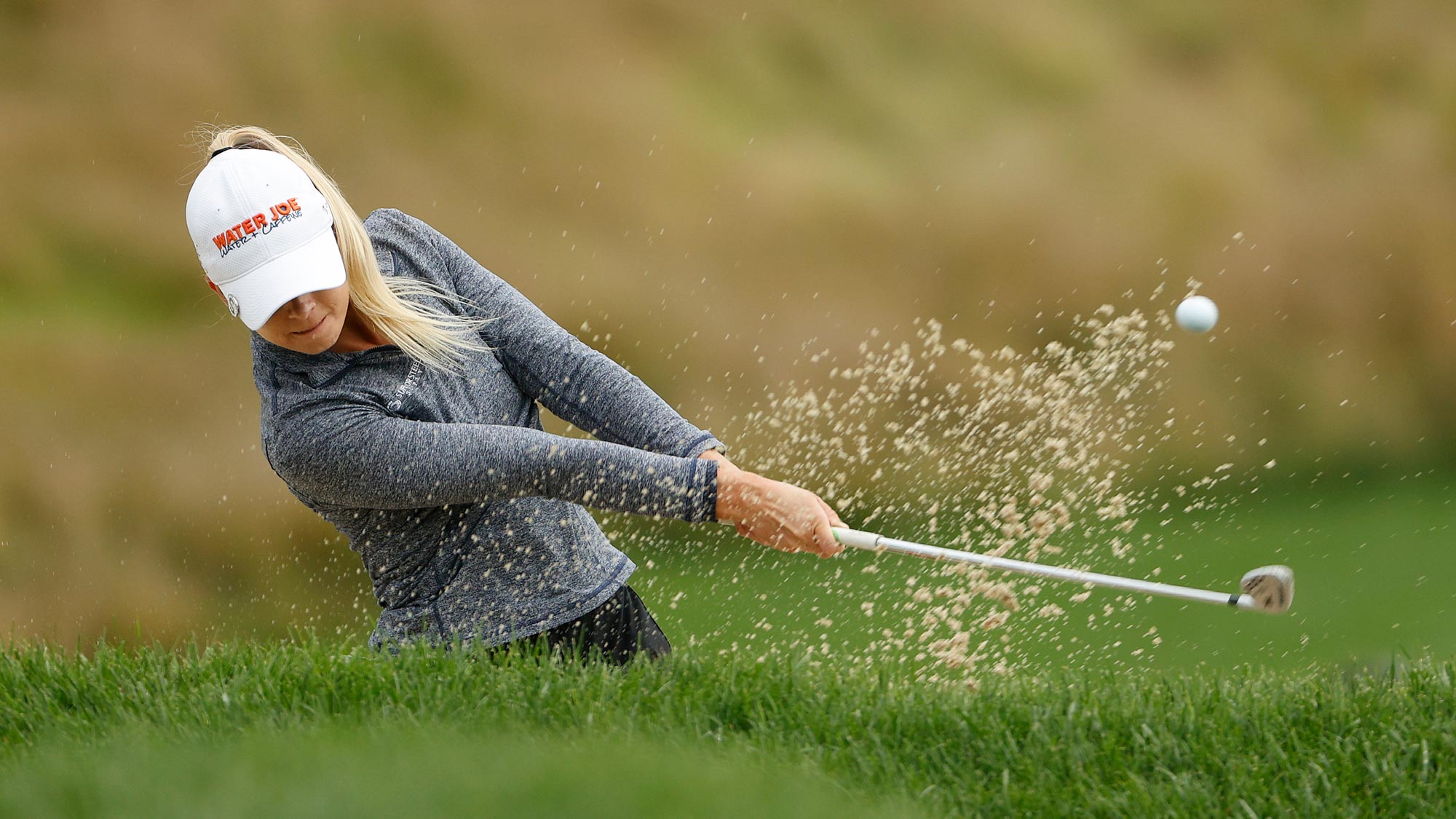 Sarah Burnham plays a shot from a bunker on the 12th hole during the final round of the LPGA Drive On Championship